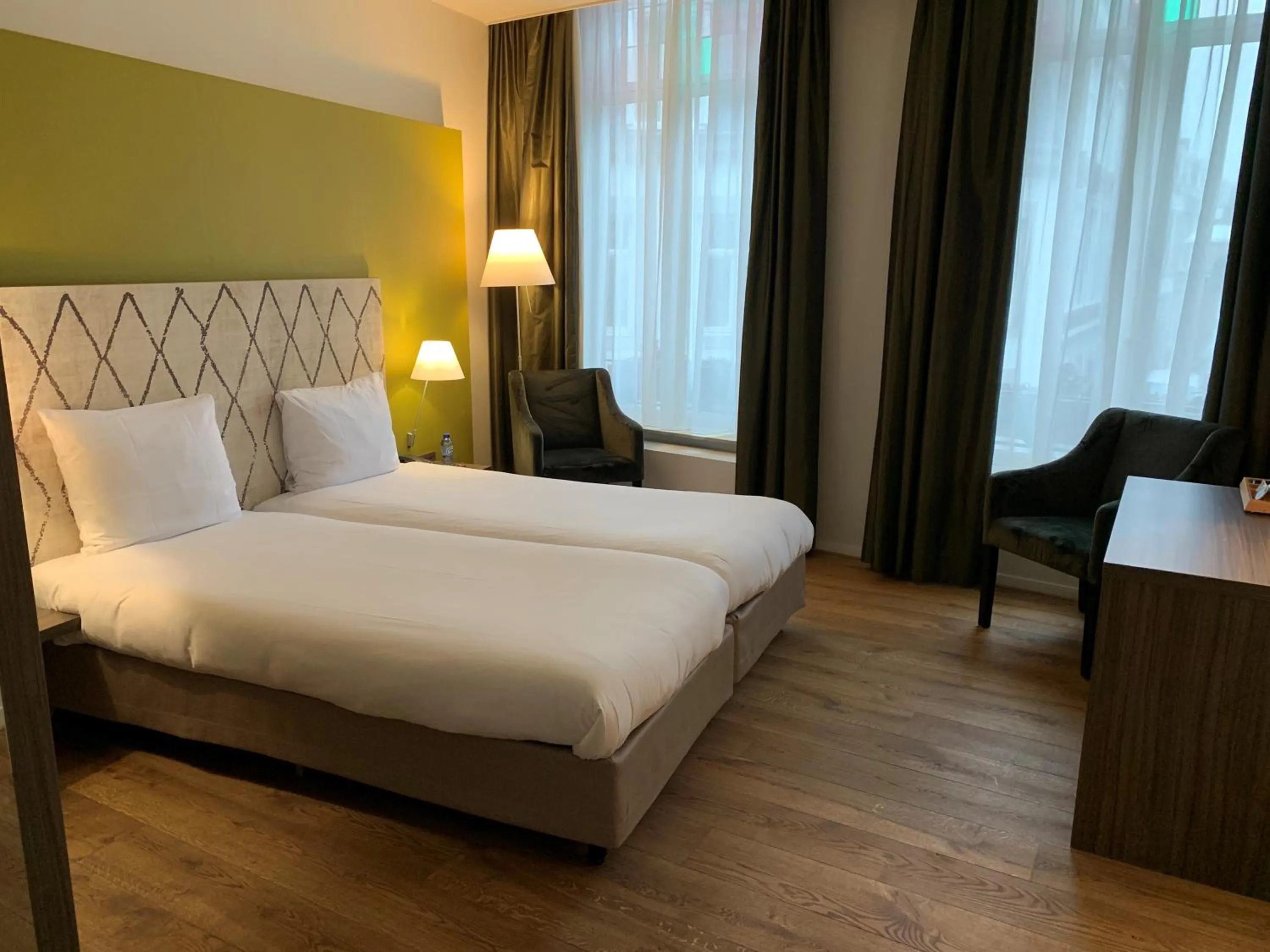 Bed in Hotel Au Quartier