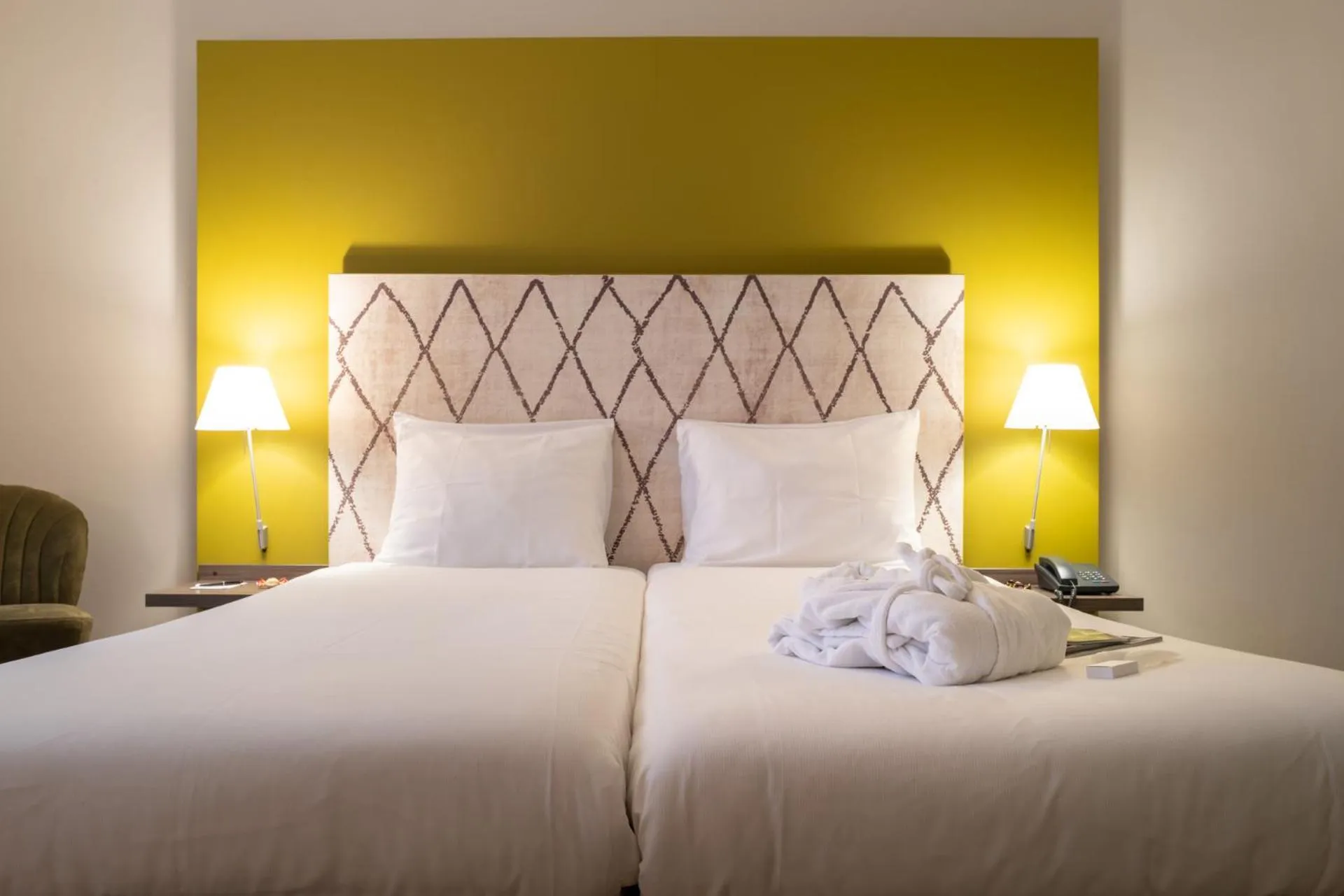 Bed in Hotel Au Quartier