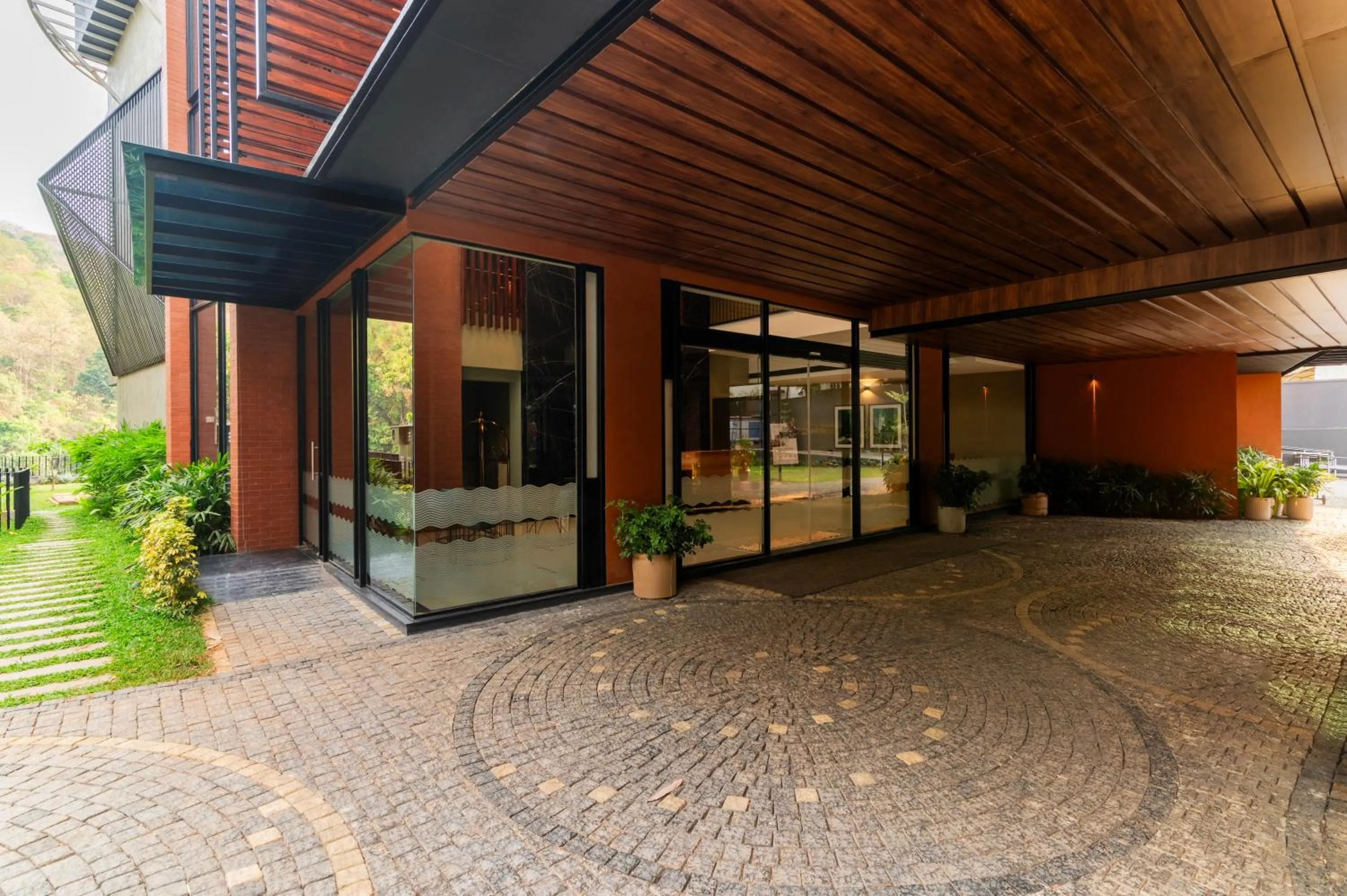 Facade/entrance in Sterling Athirappilly