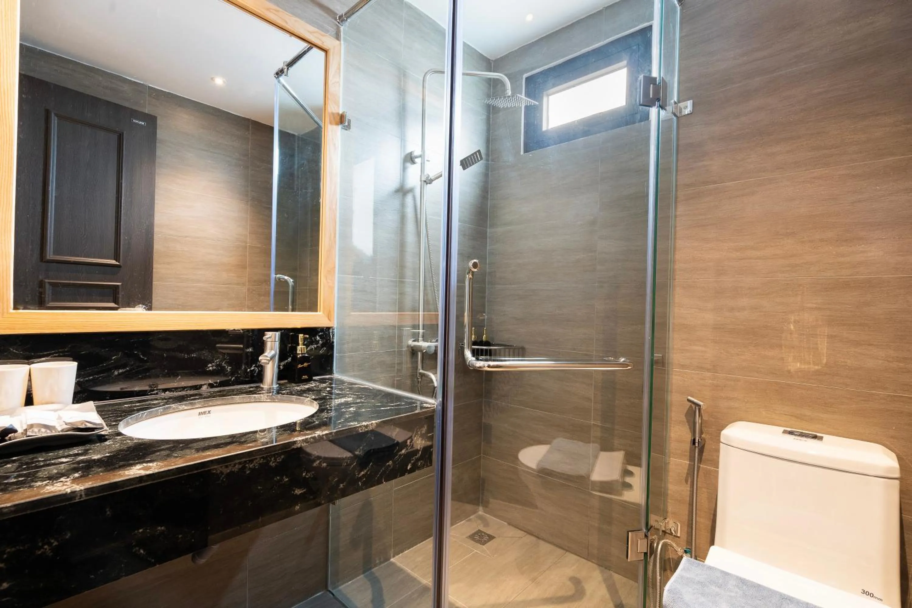 Bathroom in Haven Hut Riverside Hotel