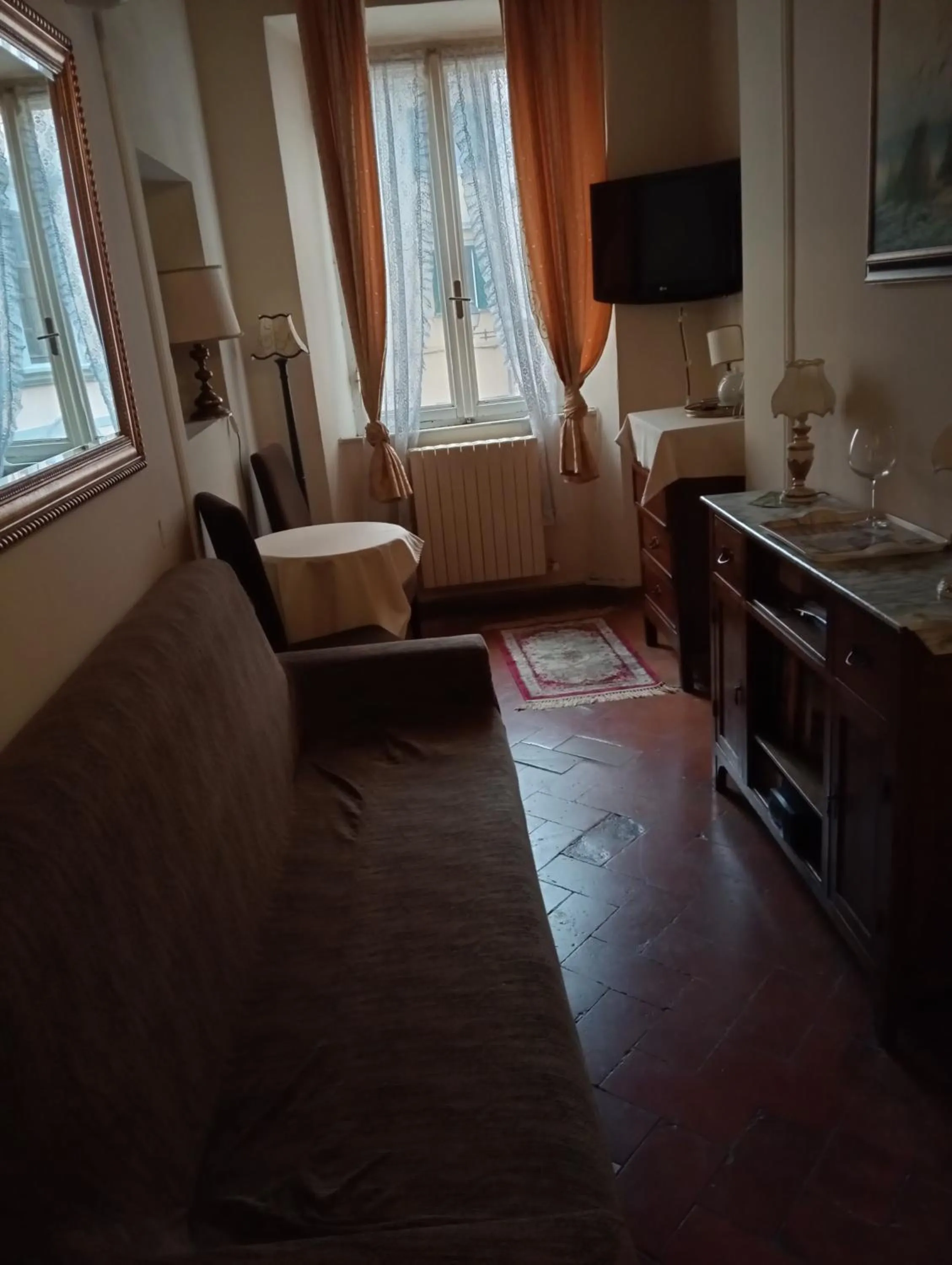 Communal lounge/ TV room, Seating Area in Relais Corso Storico