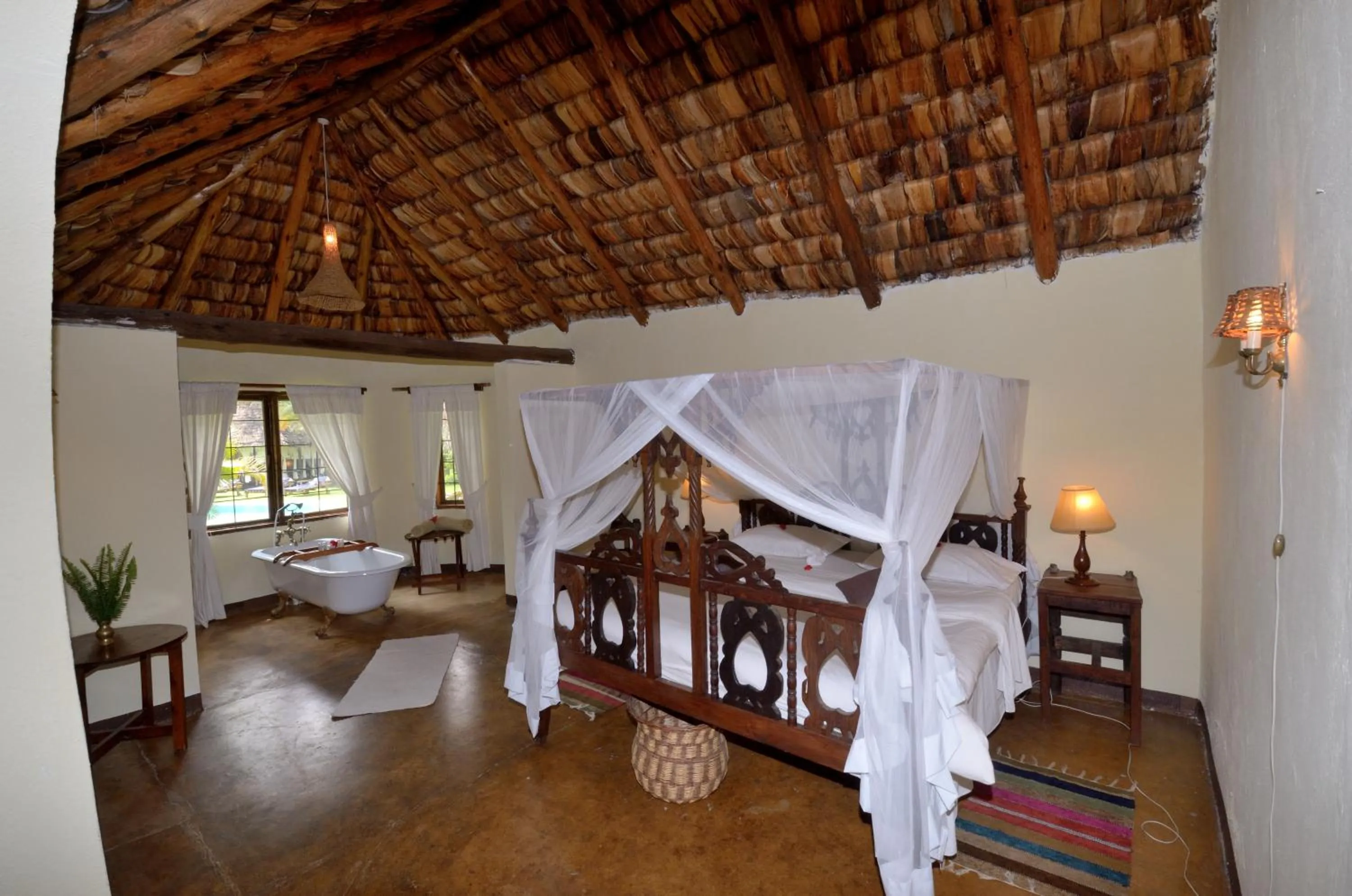 Bed in Arusha Safari Lodge