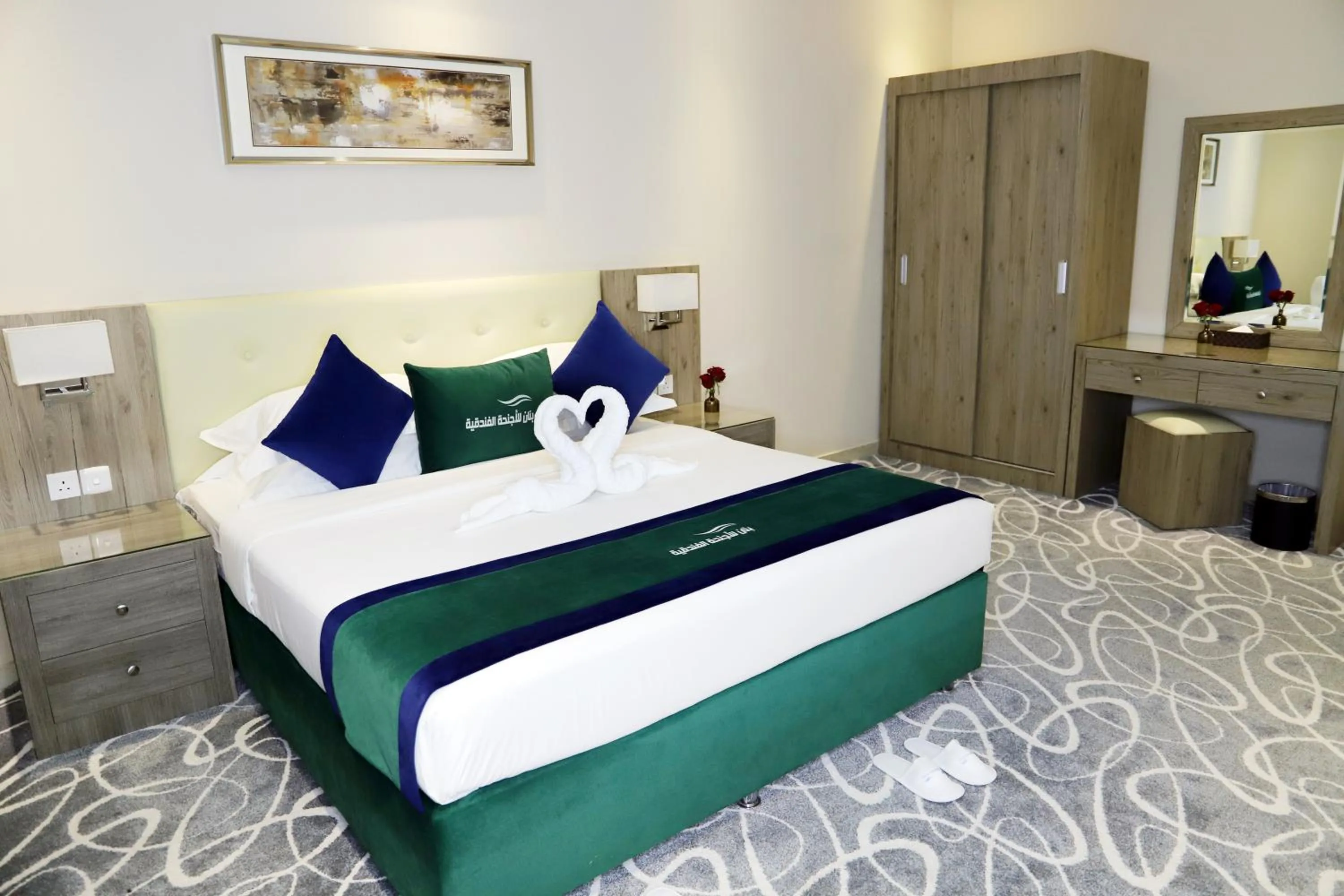 Bed in Sunrise Suites