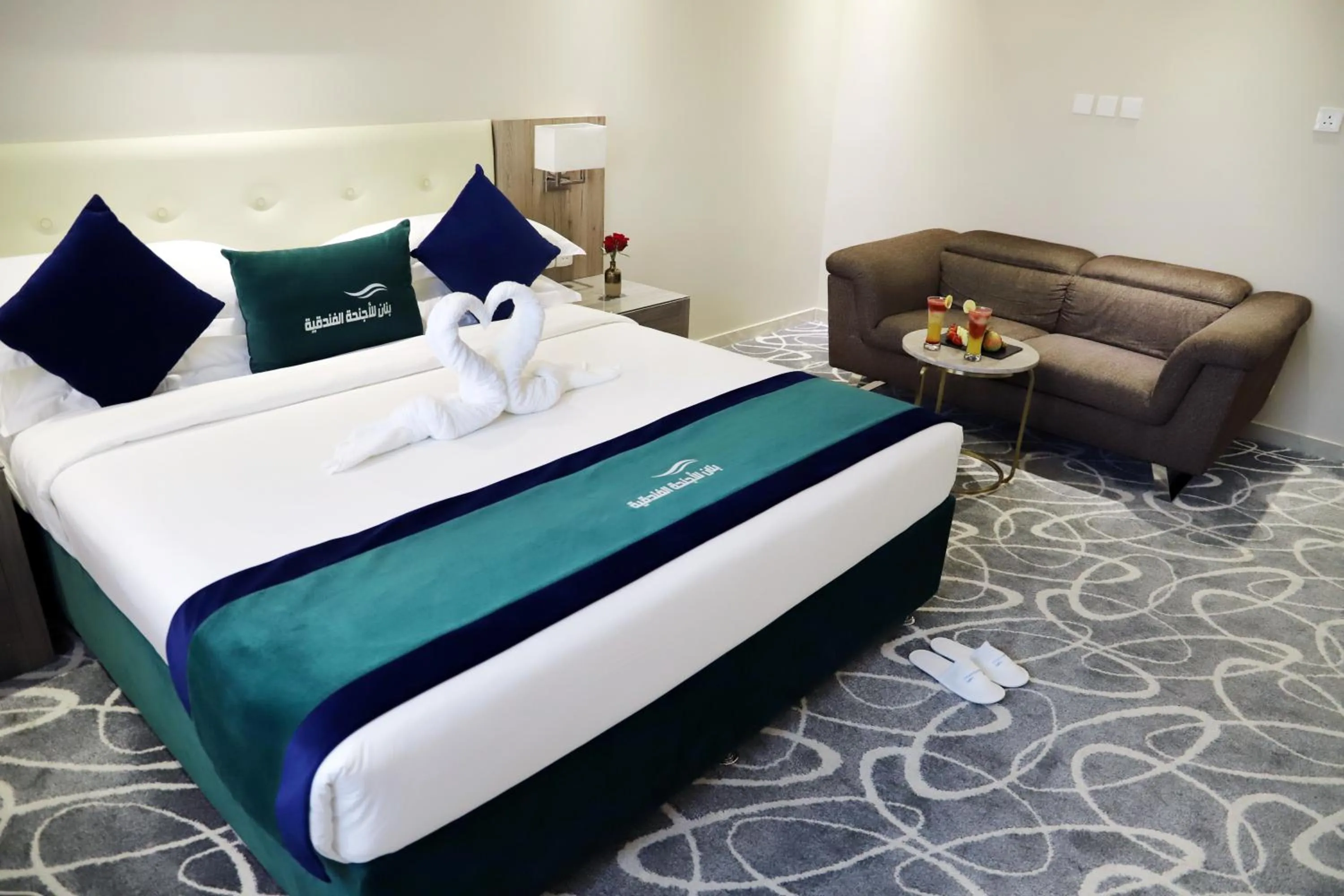 Bed in Sunrise Suites