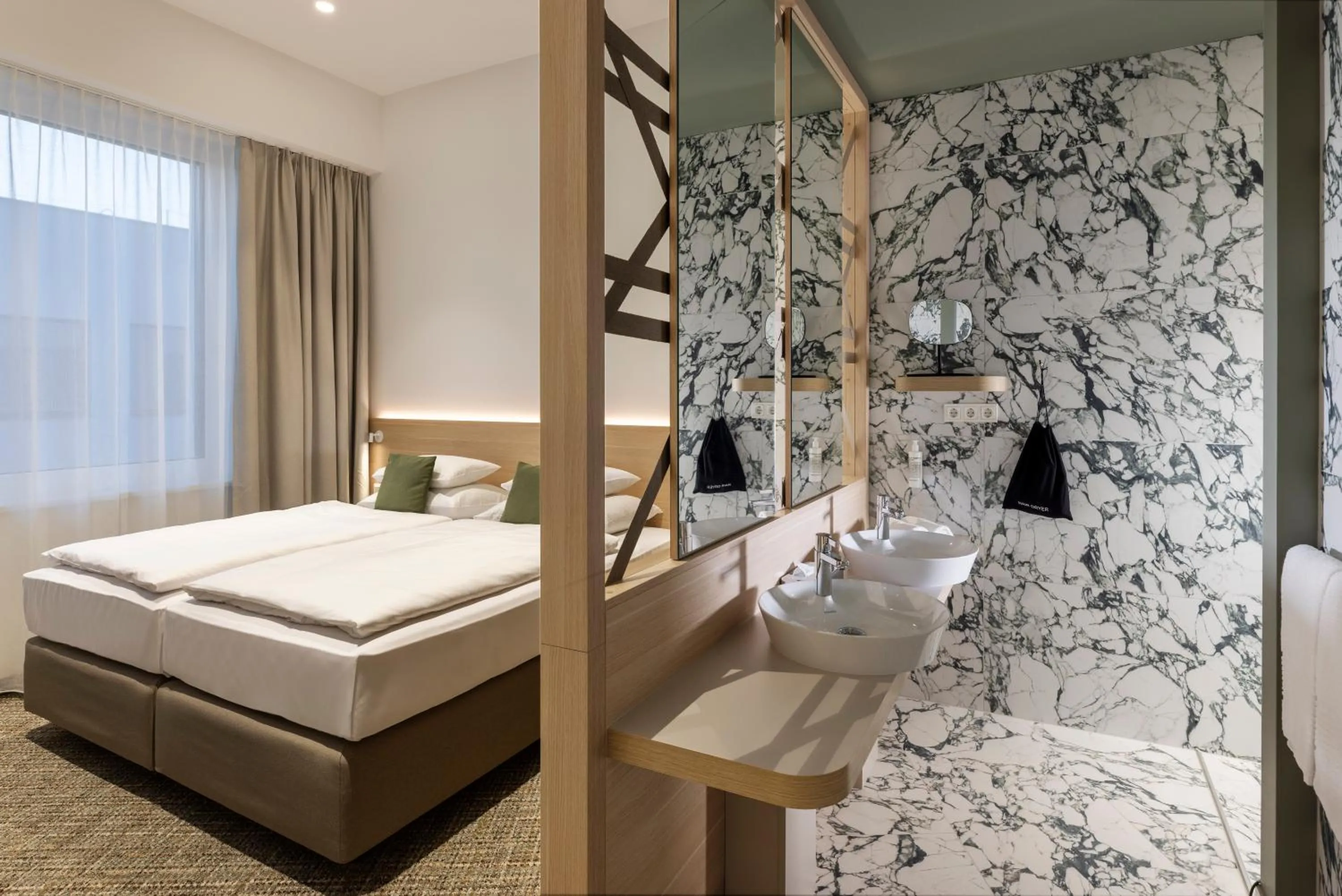 Bed in ARCOTEL AQ Wien