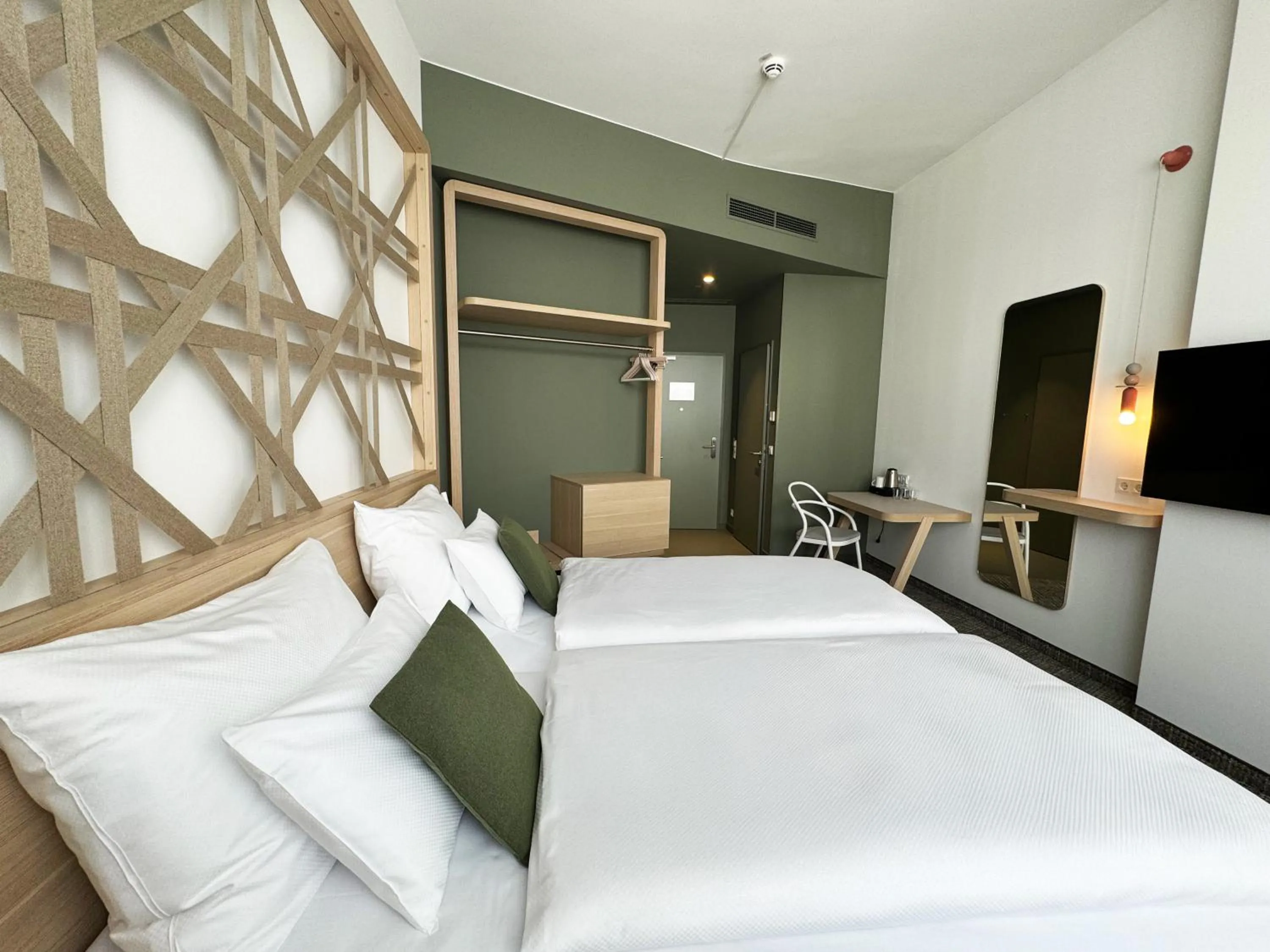 Bed in ARCOTEL AQ Wien