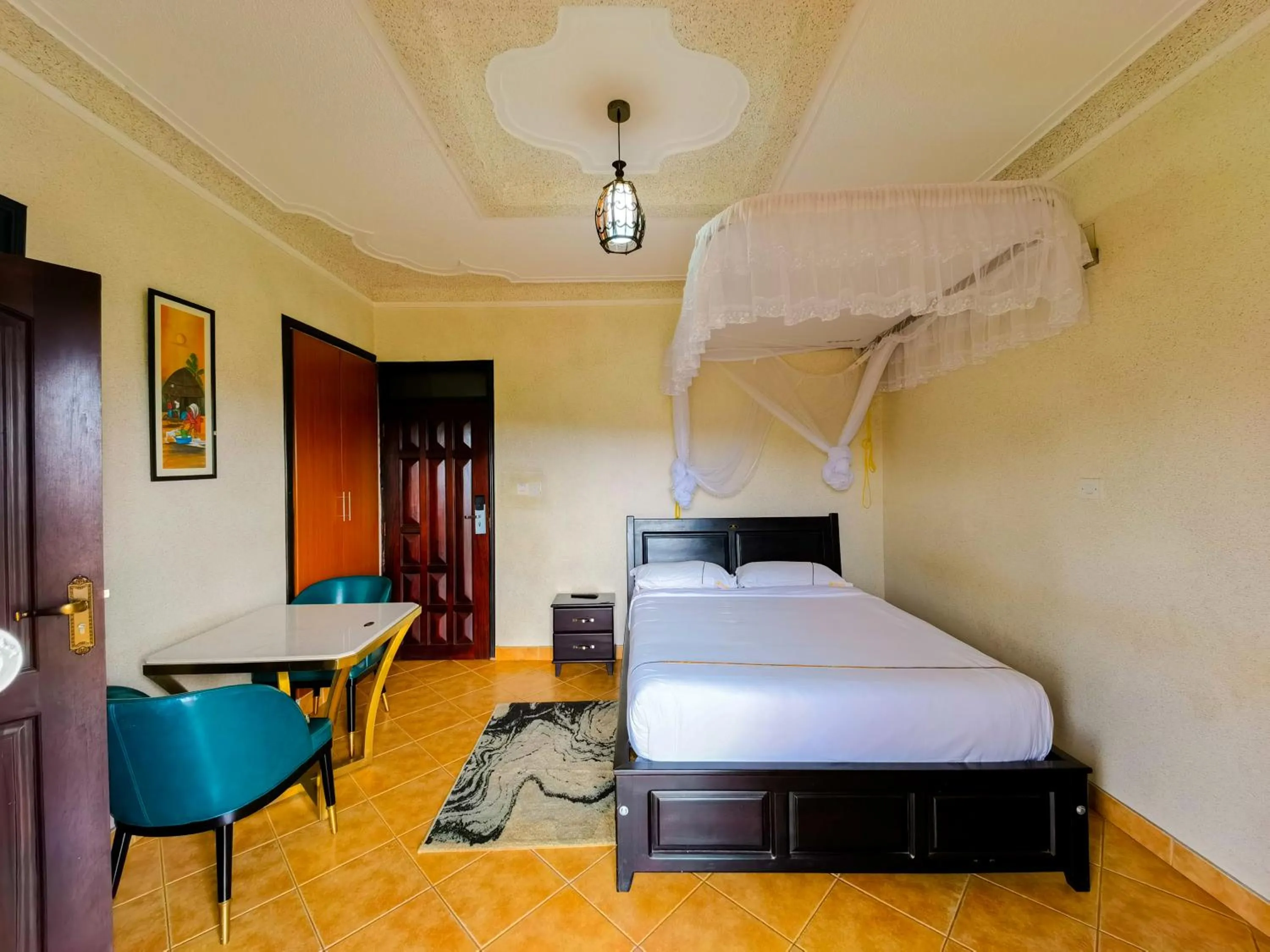 Bed in Fancy Hotel Munyonyo