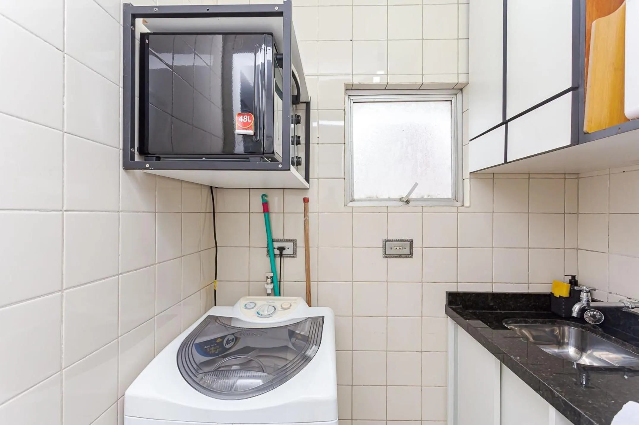 Kitchen or kitchenette in Ed. Charlie Chaplin | Prédio no coração de Curitiba | Gonzaga Stays