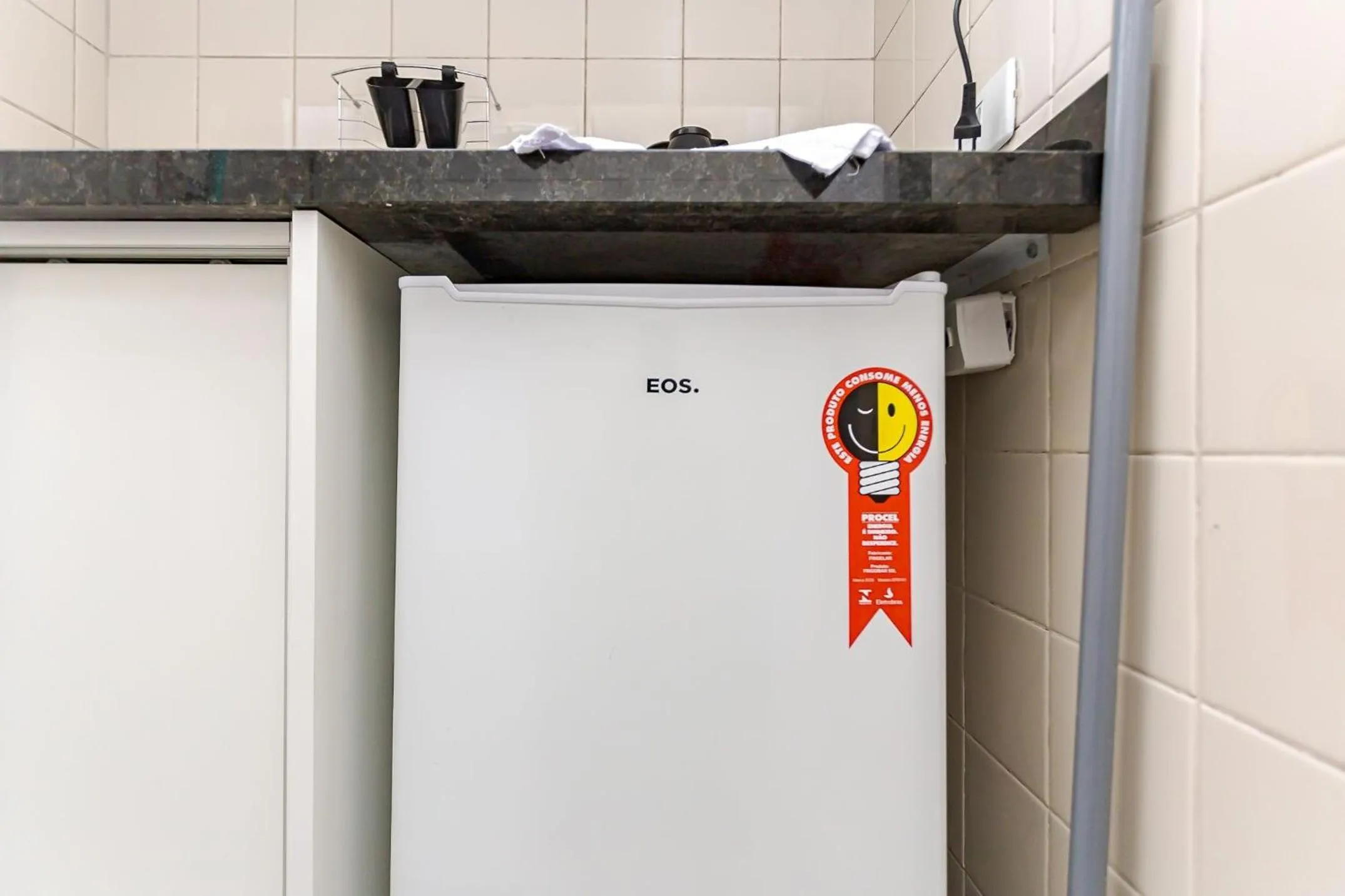 Kitchen or kitchenette in Ed. Charlie Chaplin | Prédio no coração de Curitiba | Gonzaga Stays