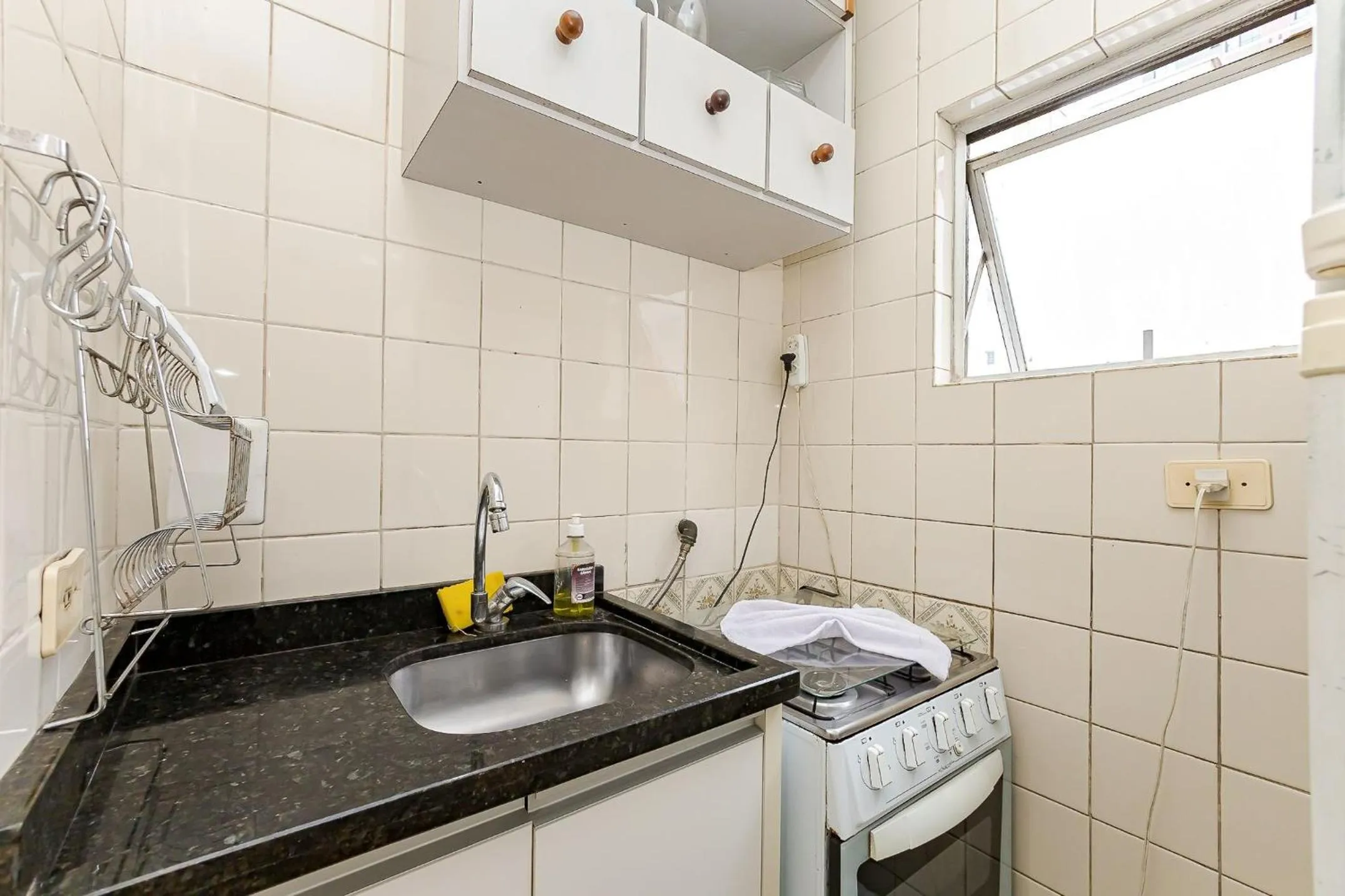 Kitchen or kitchenette in Ed. Charlie Chaplin | Prédio no coração de Curitiba | Gonzaga Stays