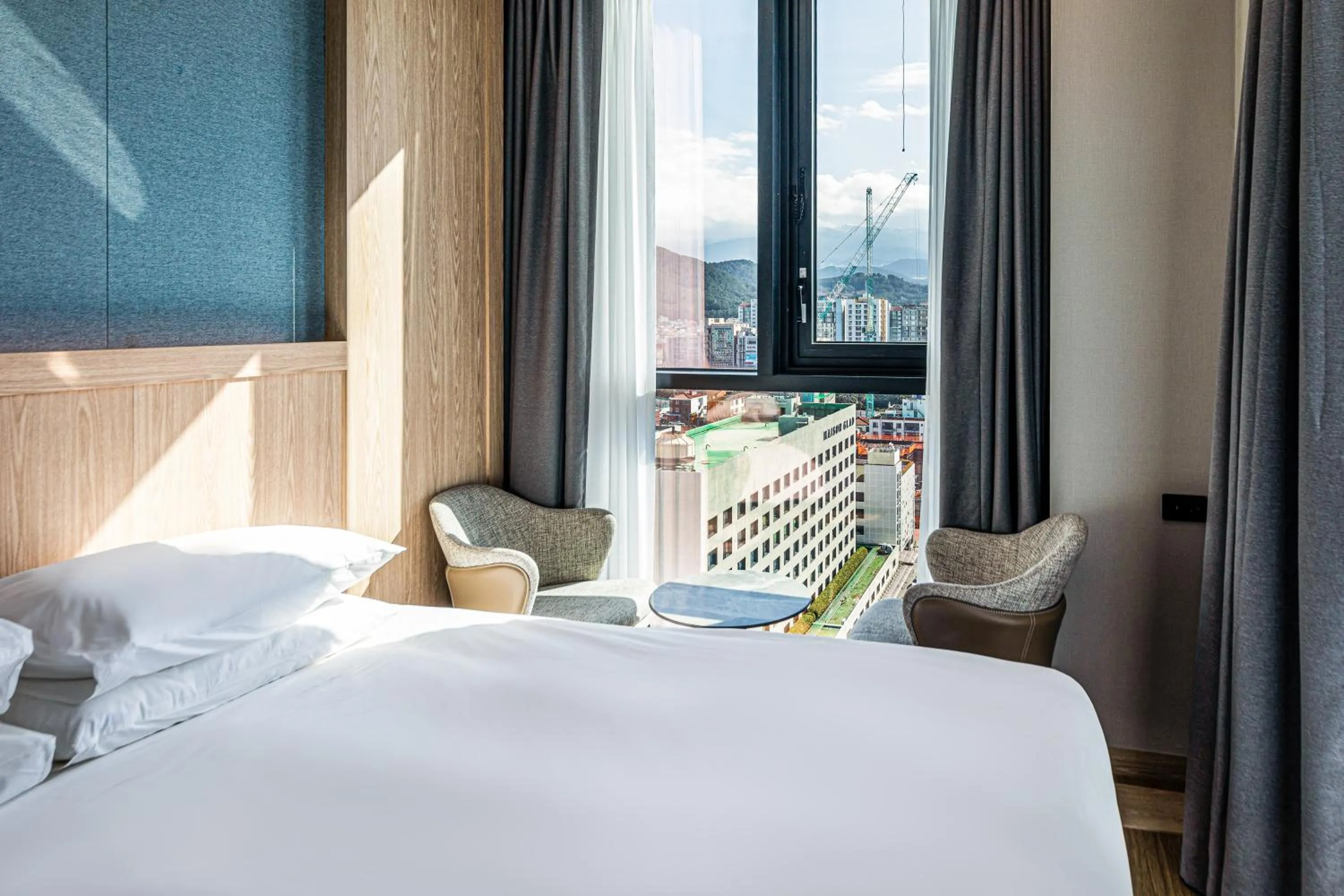 Bed in Jeju Bolton Hotel