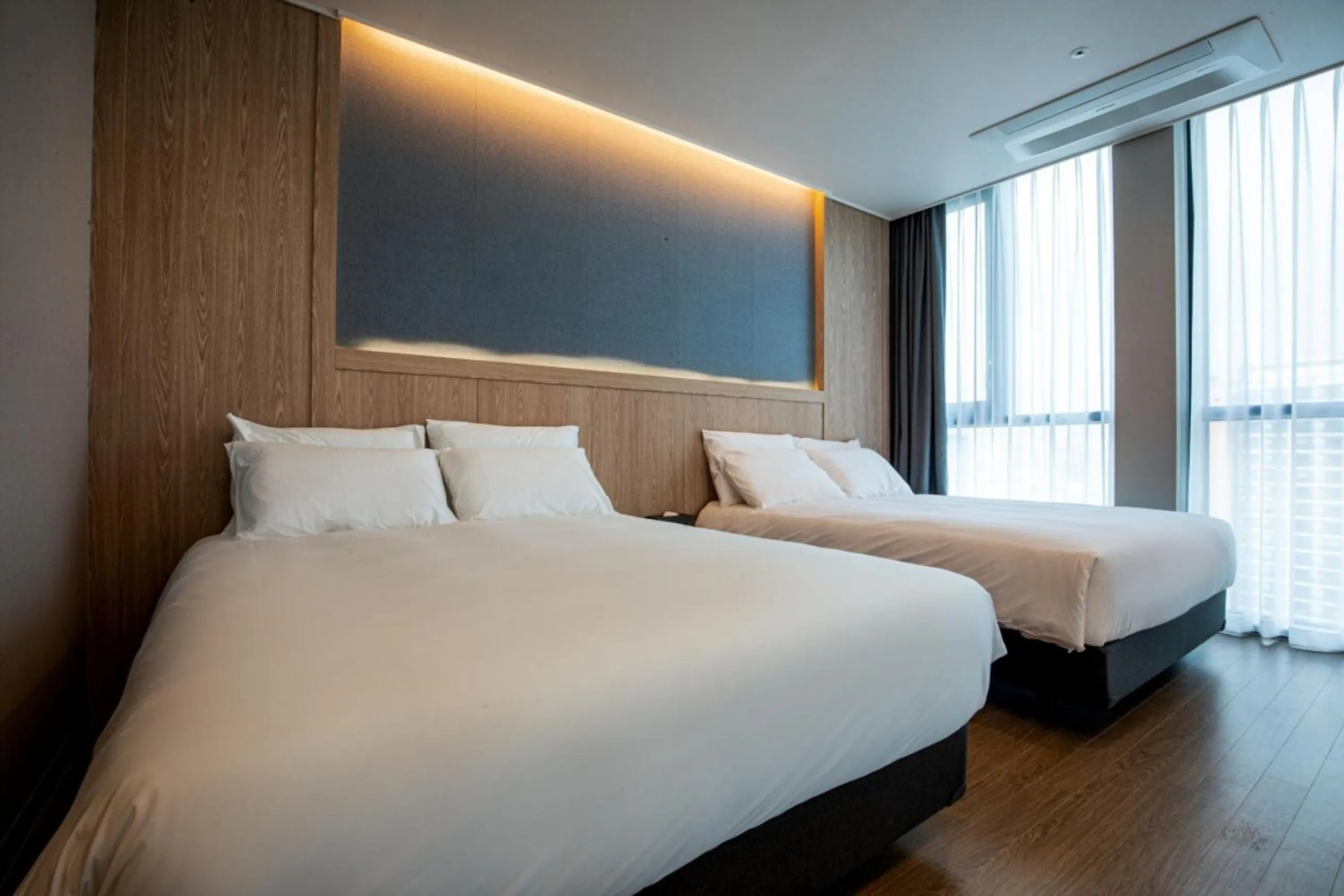 Bed in Jeju Bolton Hotel