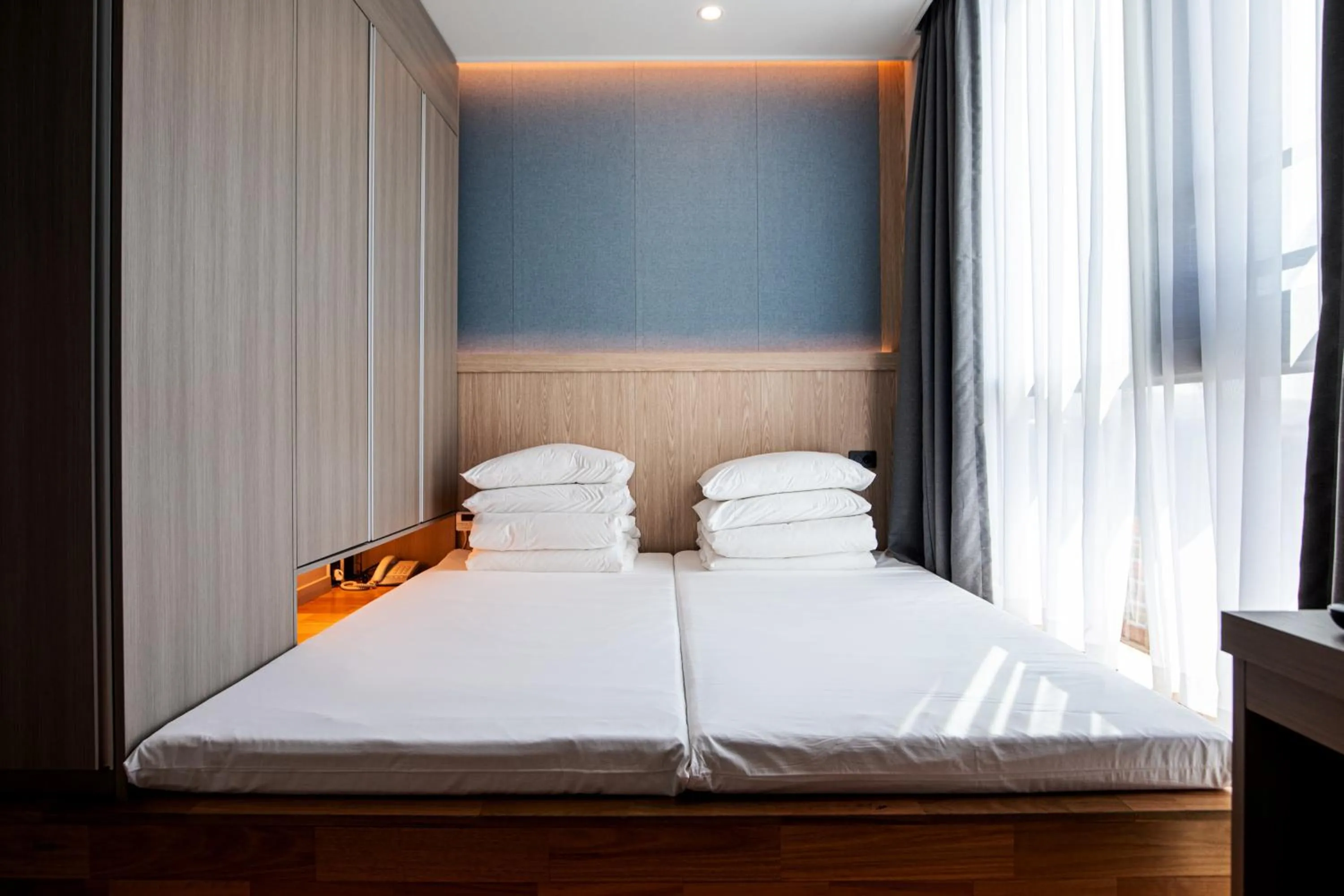 Bed in Jeju Bolton Hotel