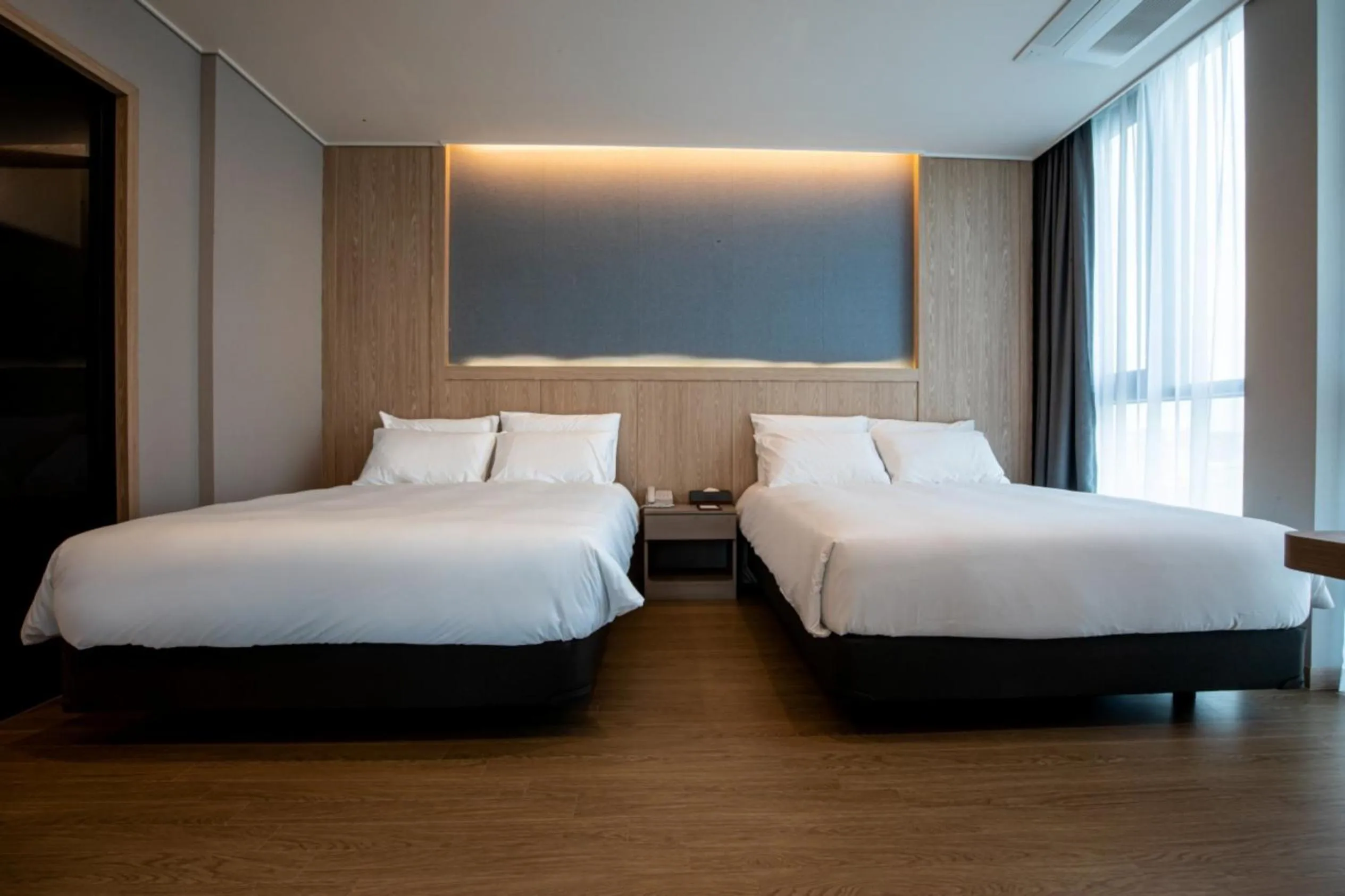 Bed in Jeju Bolton Hotel