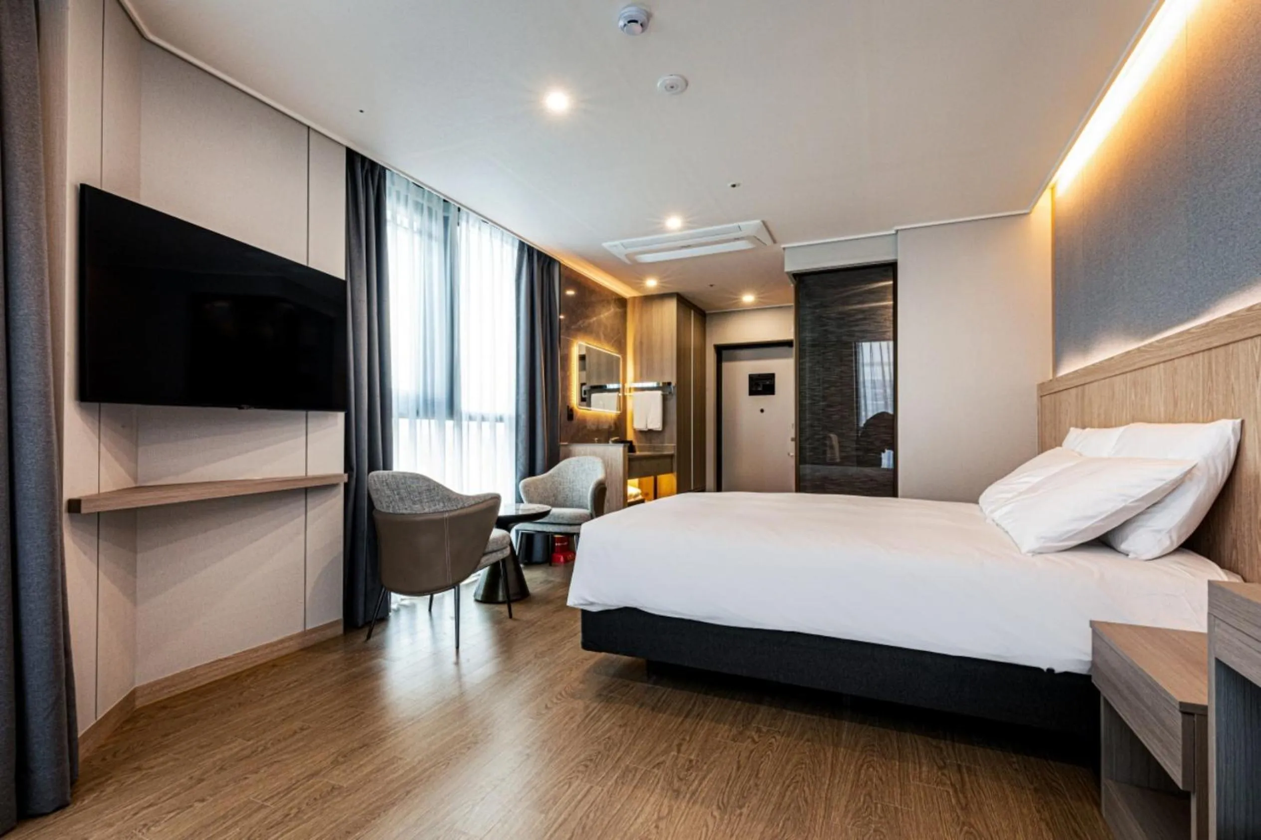 Bed in Jeju Bolton Hotel