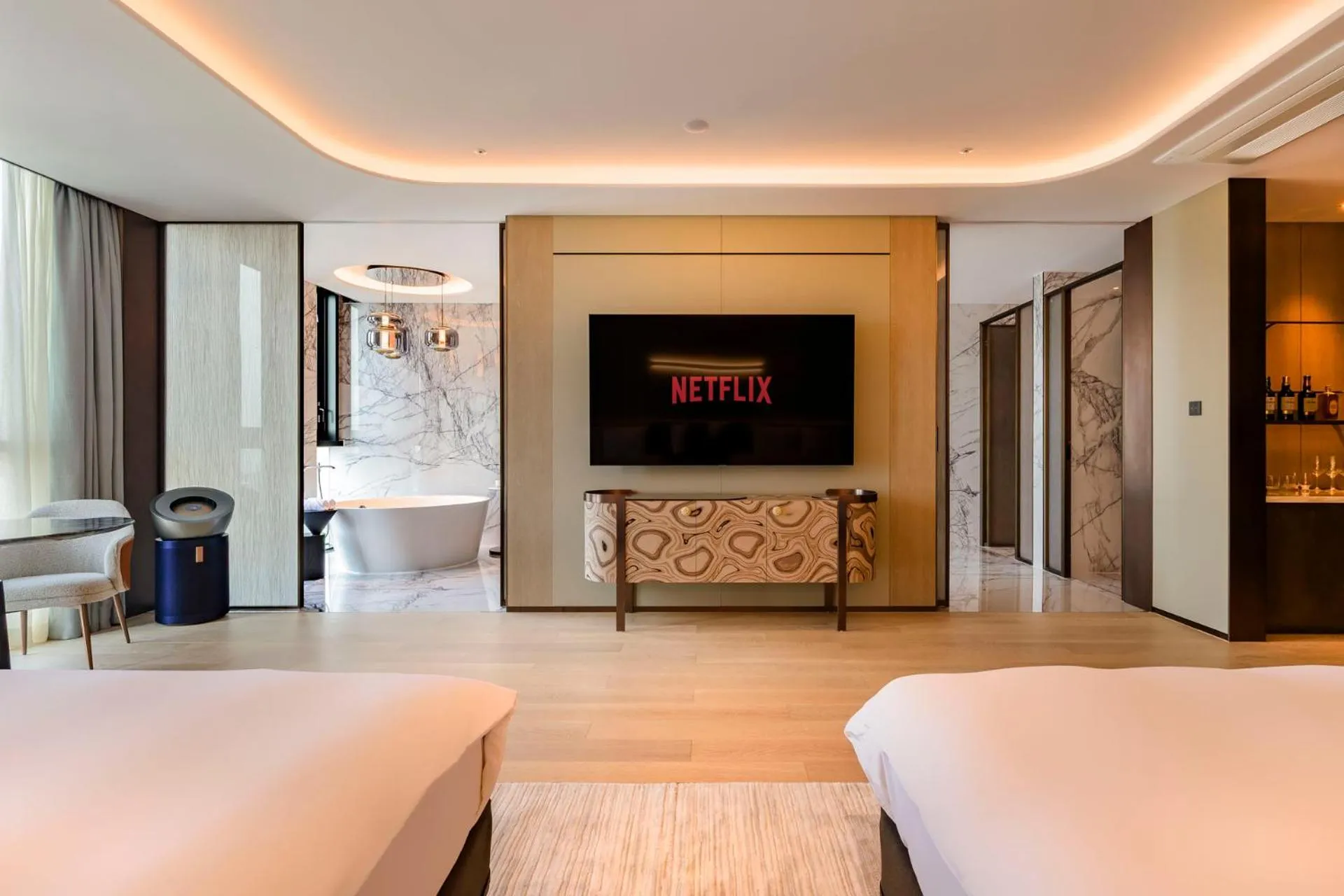 Communal lounge/ TV room, Bed in Jeju Bolton Hotel