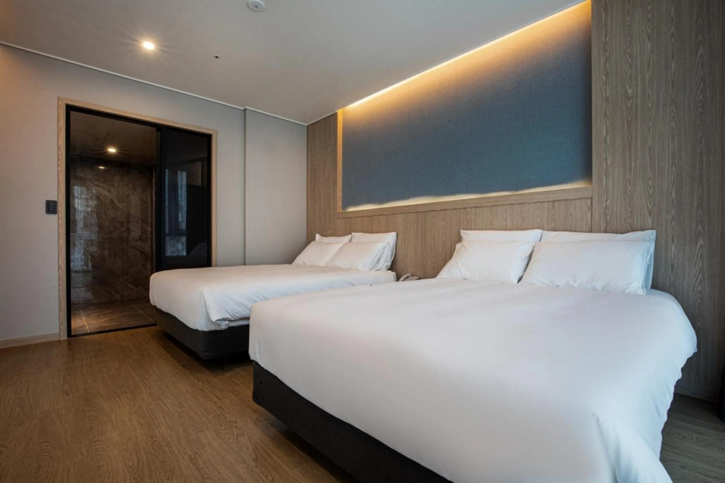 Bed in Jeju Bolton Hotel