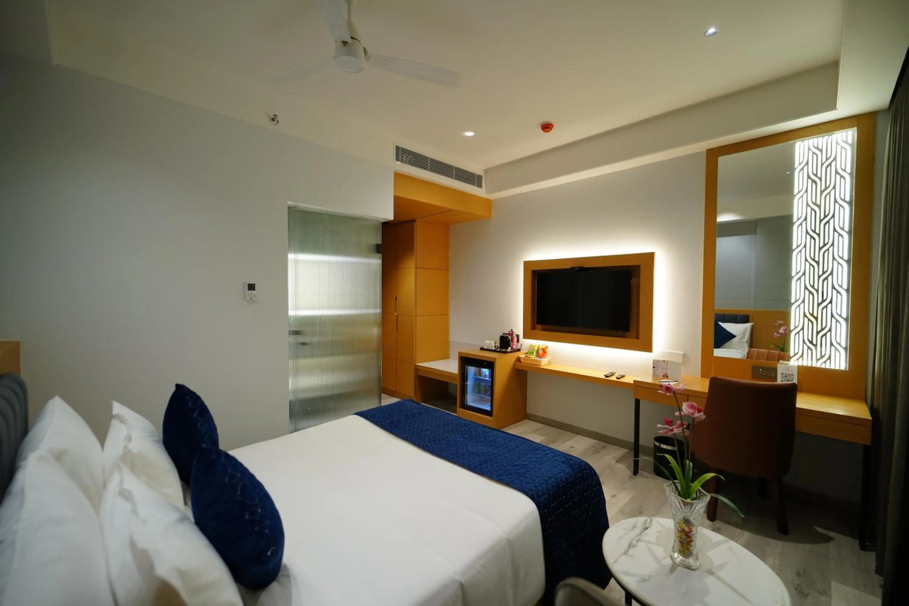 TV and multimedia, Bed in Regenta Inn Bhavani Nellore By Royal Orchid Hotels