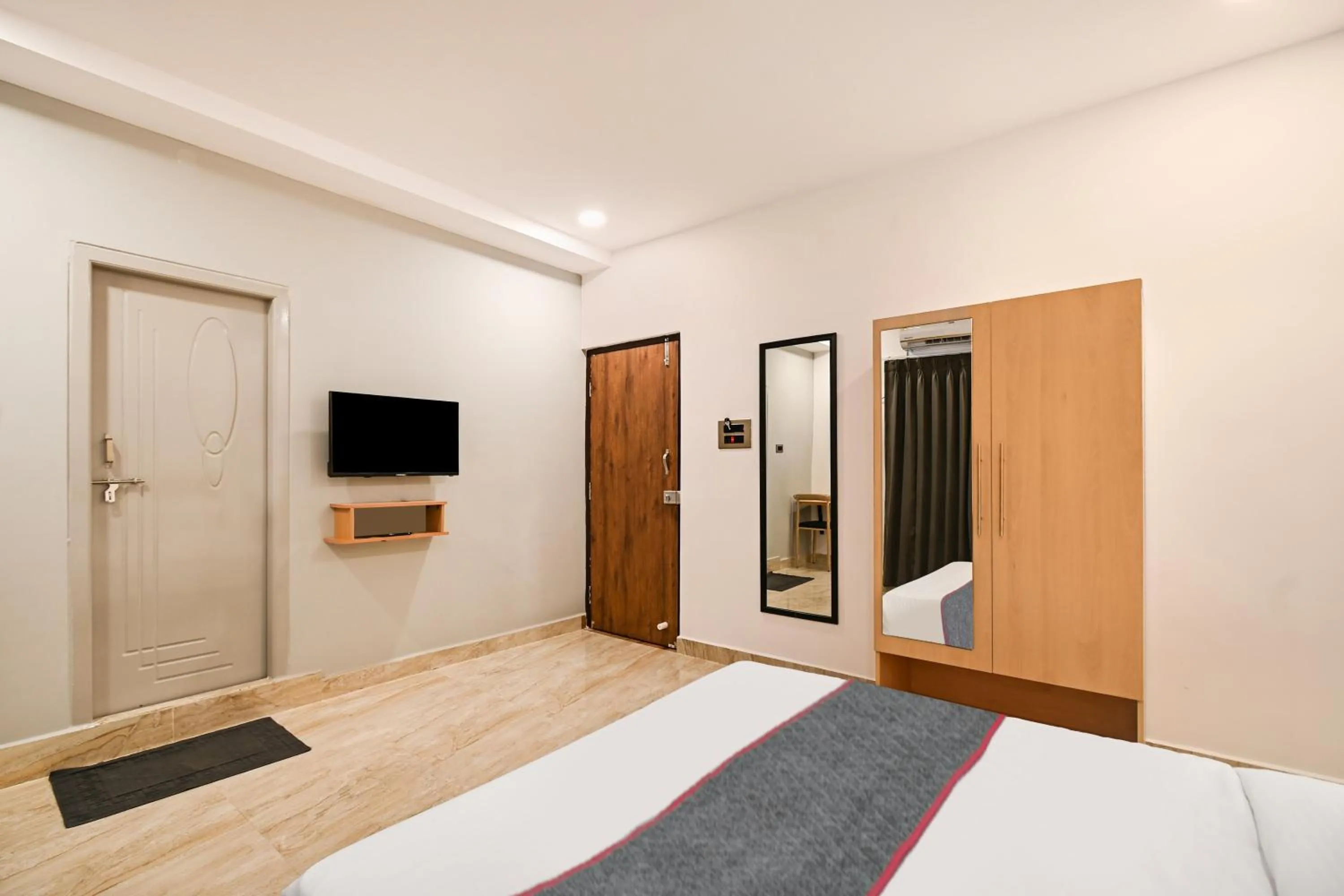 Bedroom in Super Townhouse De Alphabet Karmanghat