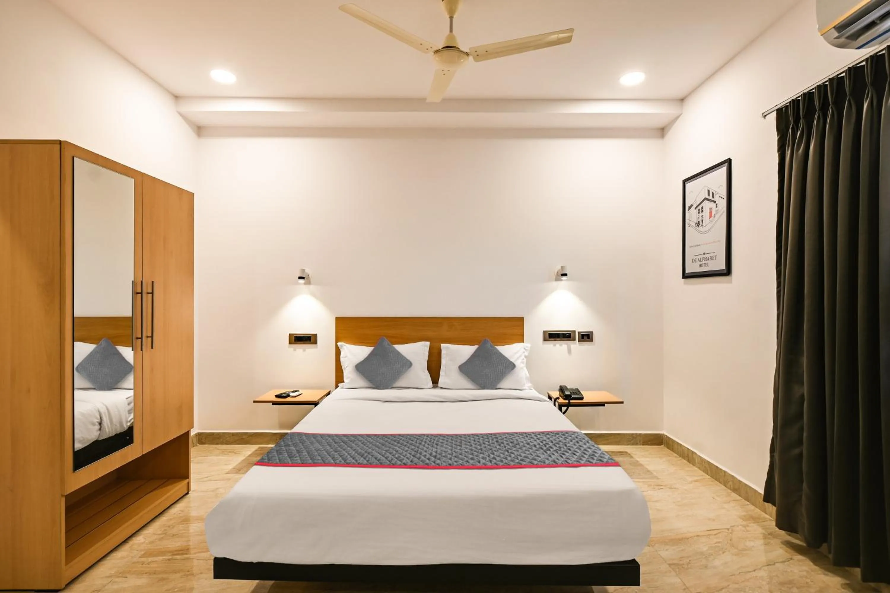 Bedroom in Super Townhouse De Alphabet Karmanghat