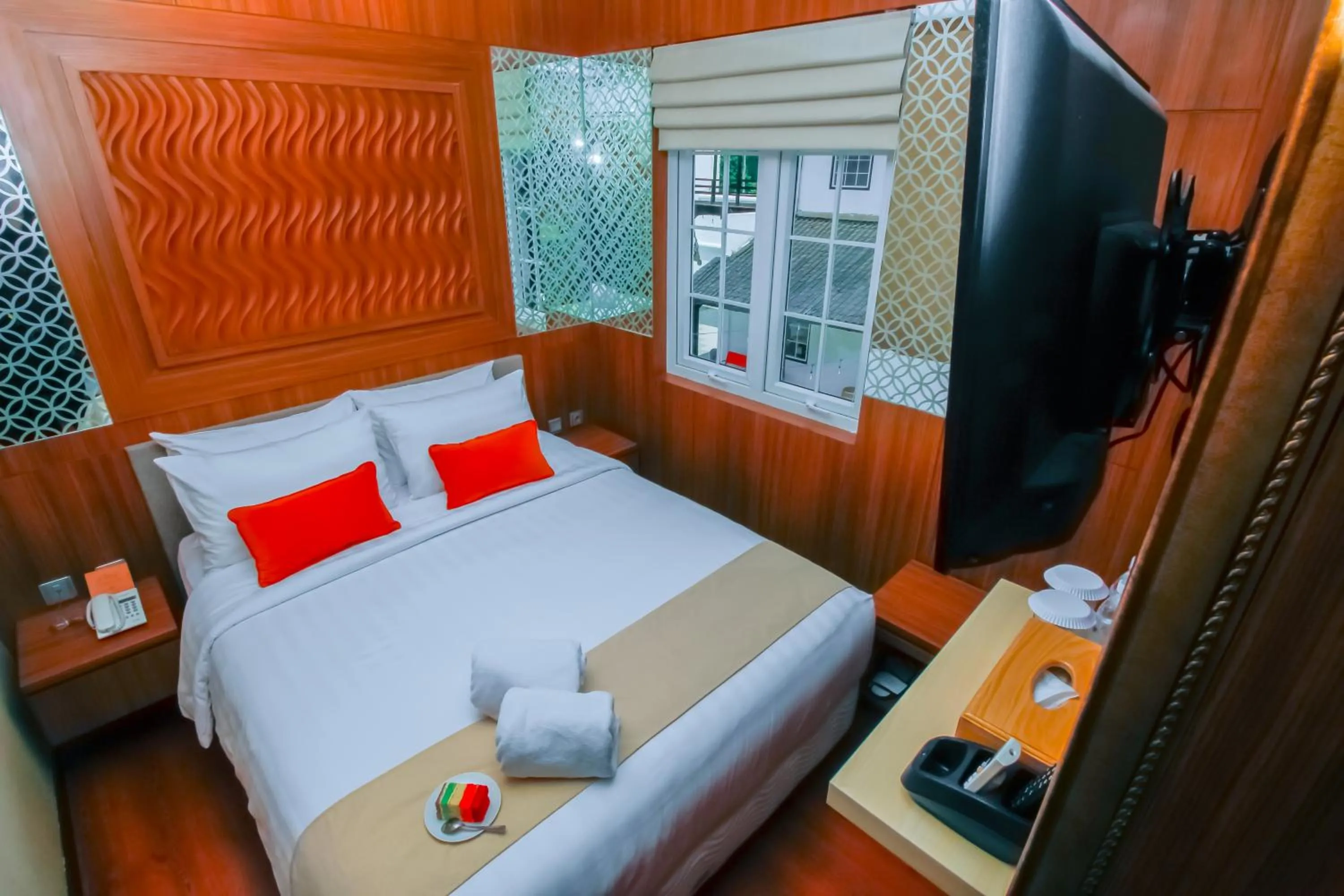 Bed in PETIT BOUTIQUE HOTEL SOLO