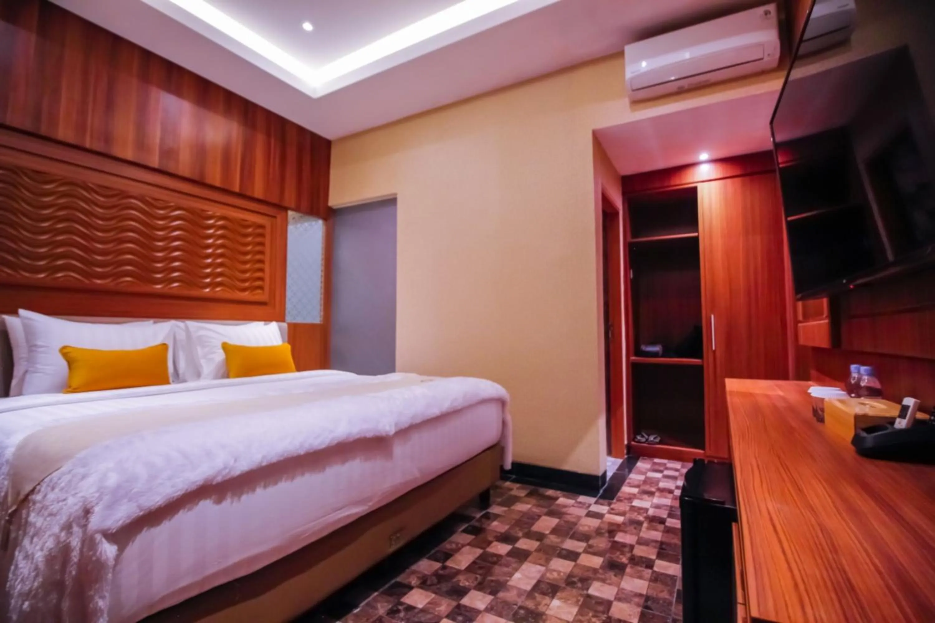 Bed in PETIT BOUTIQUE HOTEL SOLO