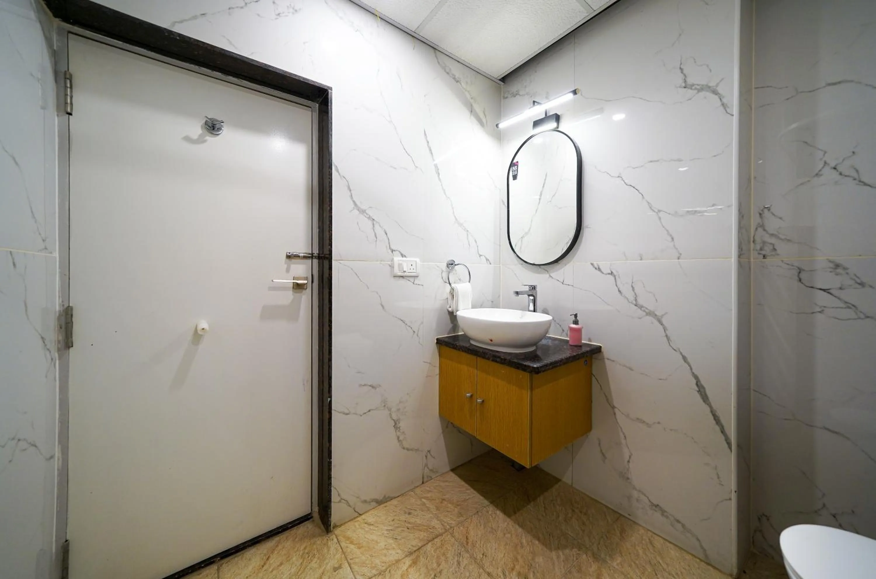 Bathroom in Olive Hotel Hebbal by Embassy Group