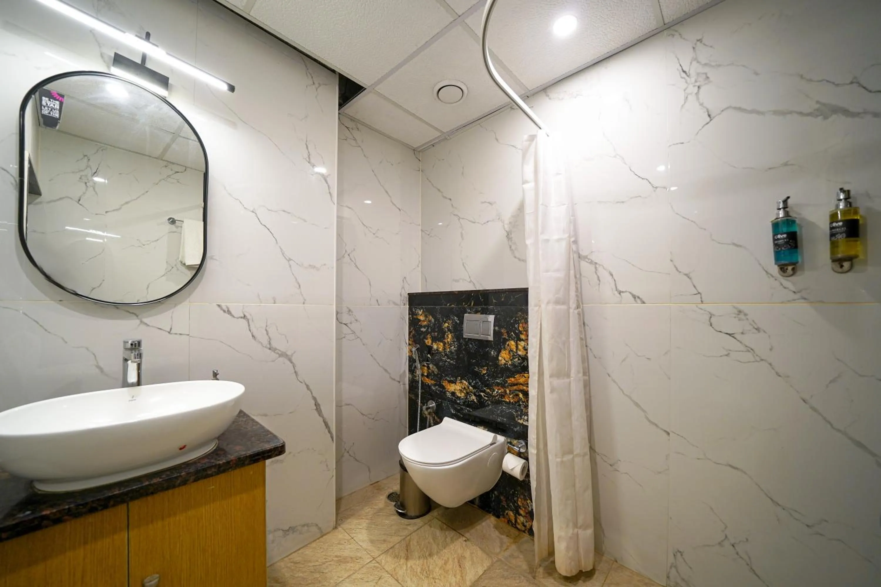 Bathroom in Olive Hotel Hebbal by Embassy Group