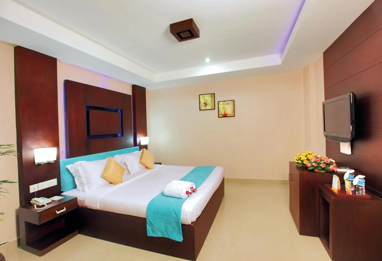 Bed in HOTEL SRIVATSA REGENCY