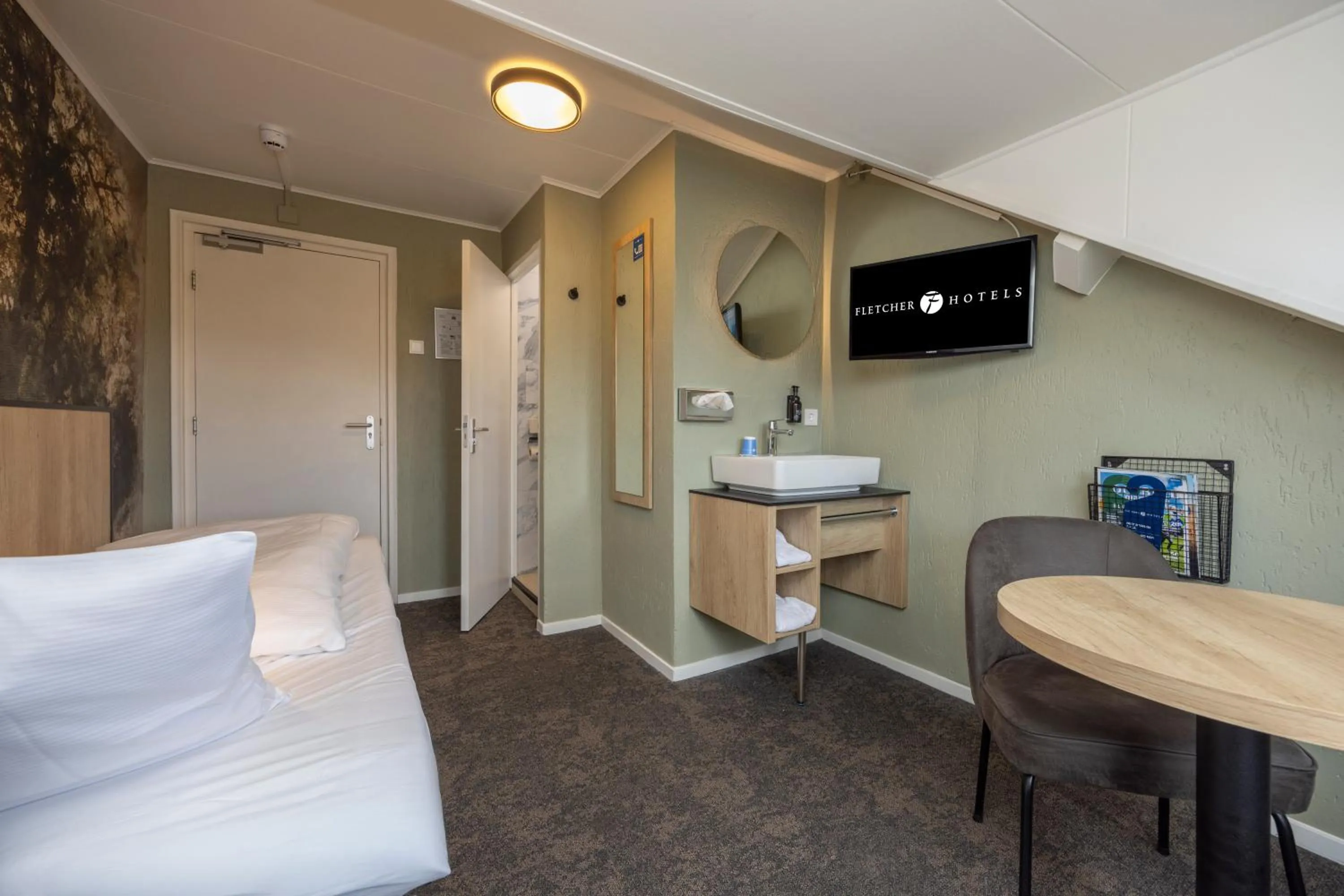 Photo of the whole room, Bed in Fletcher Hotel Restaurant Bon Repos