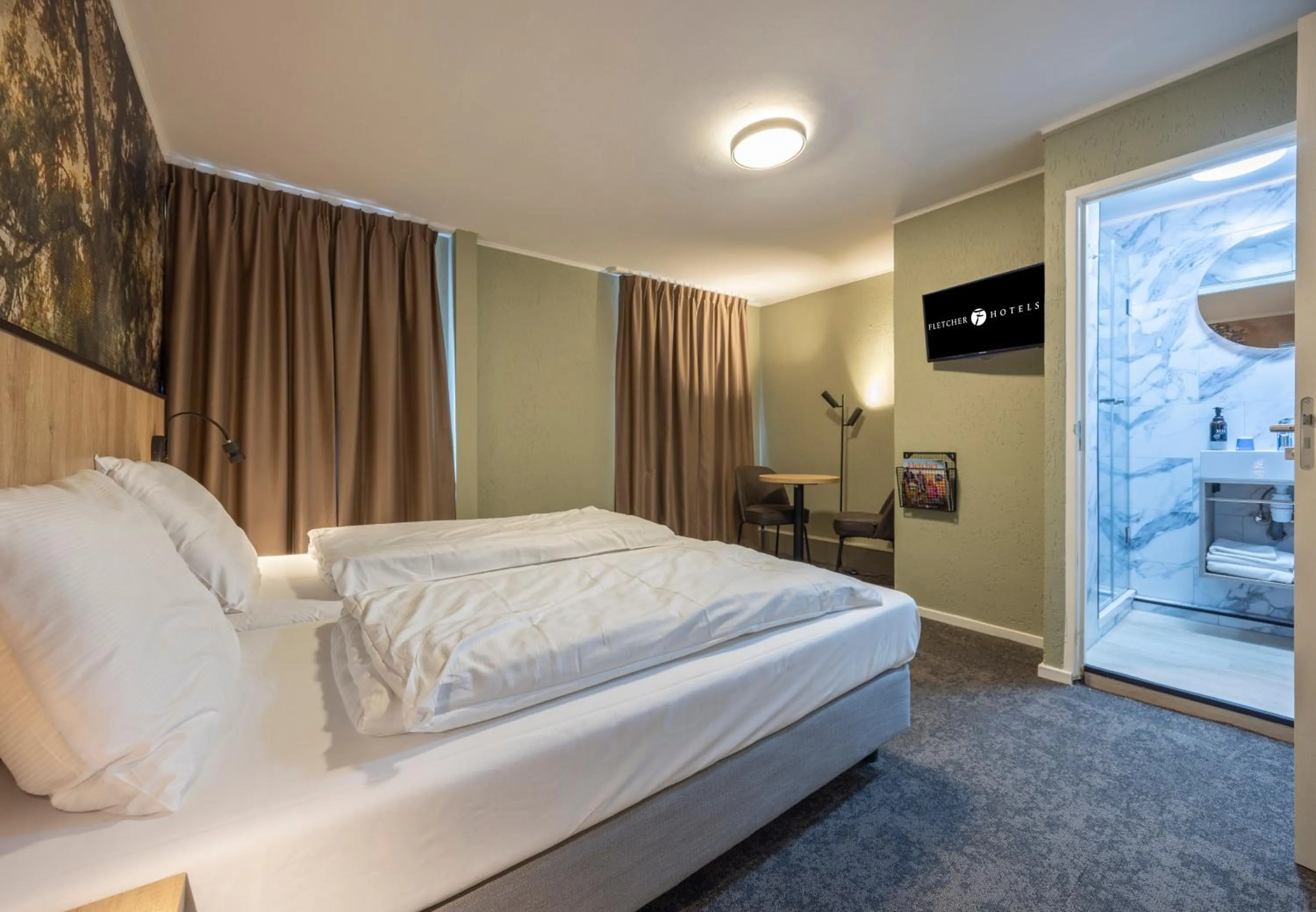 Bed in Fletcher Hotel Restaurant Bon Repos