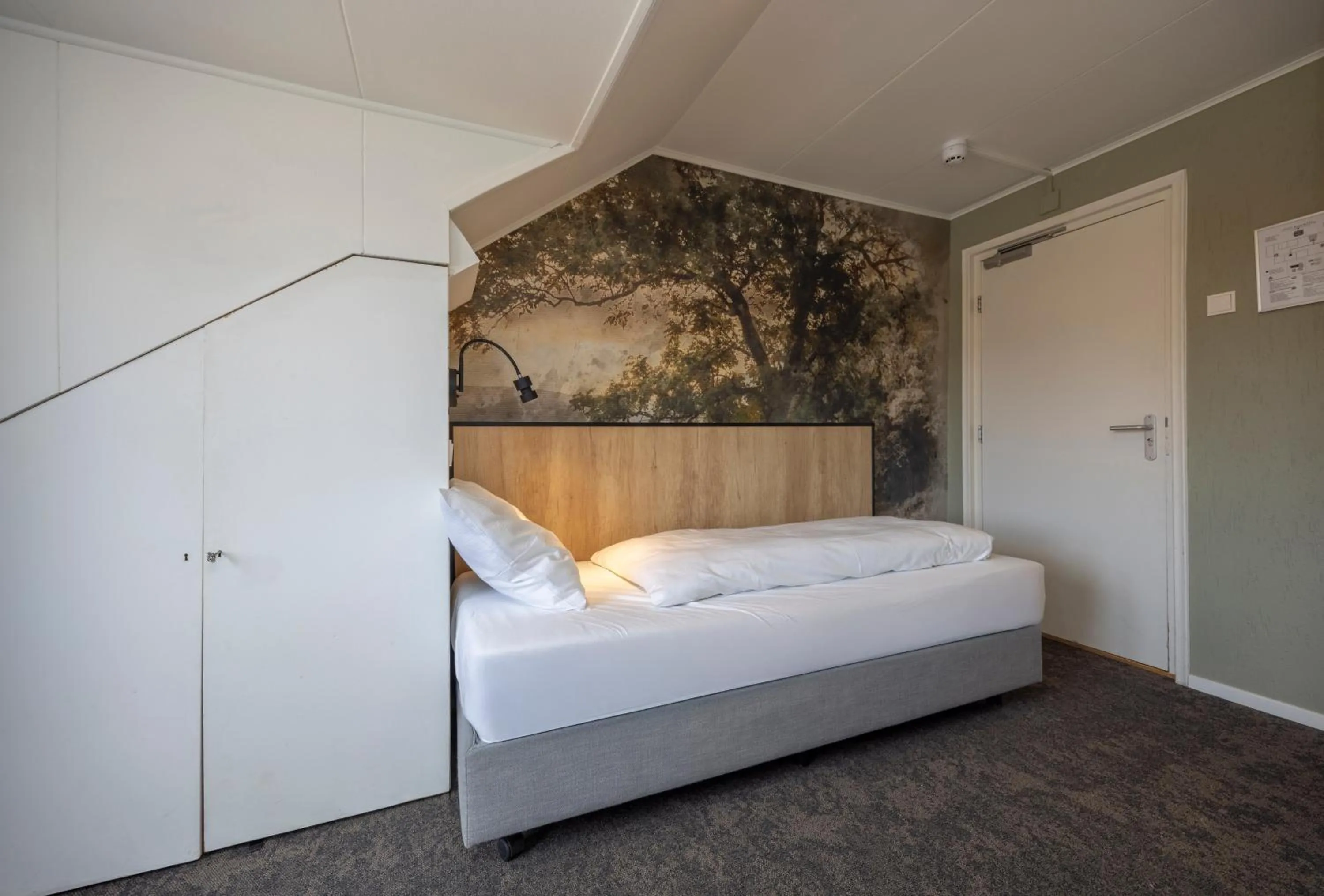 Bed in Fletcher Hotel Restaurant Bon Repos