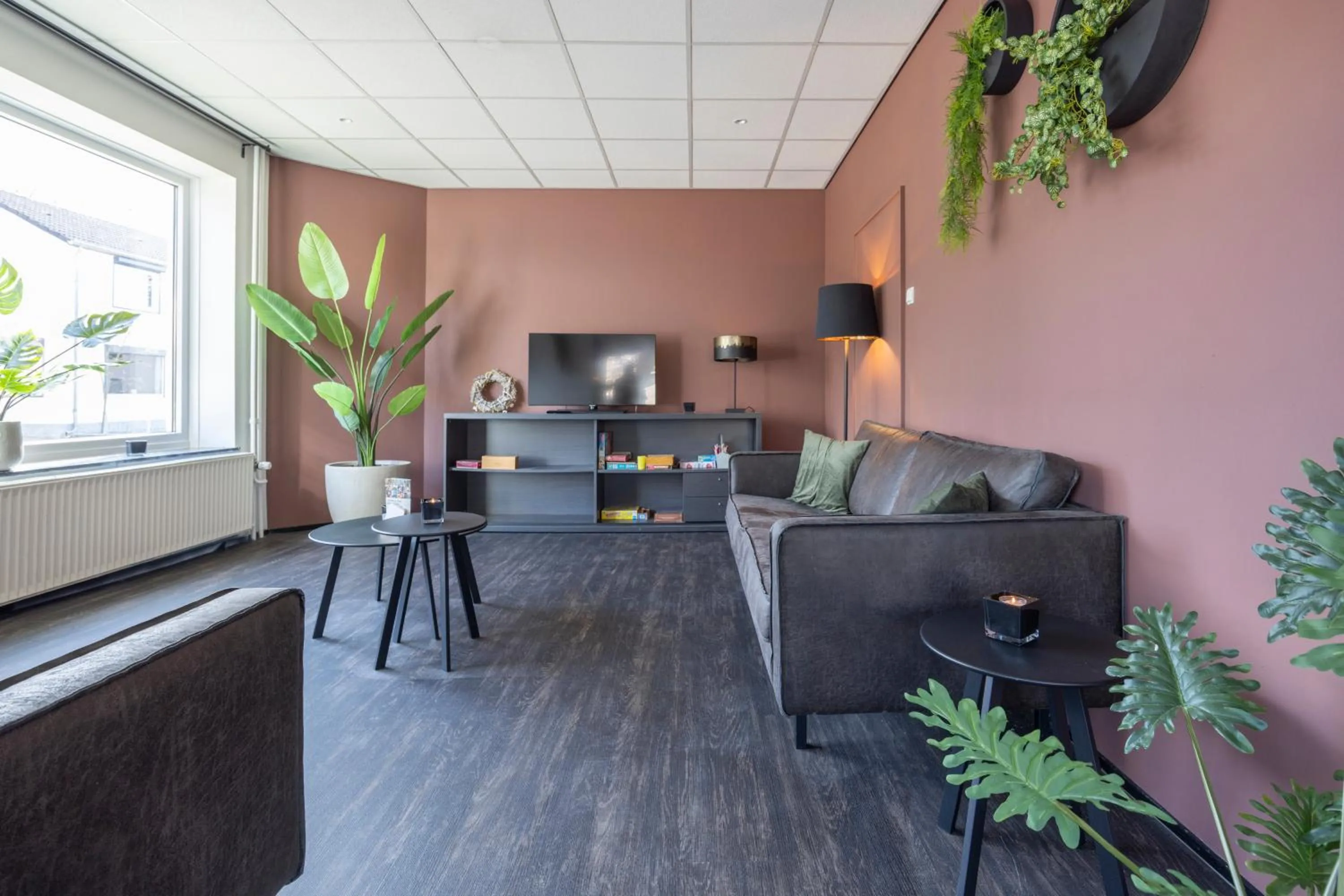 Communal lounge/ TV room in Fletcher Hotel Restaurant Bon Repos