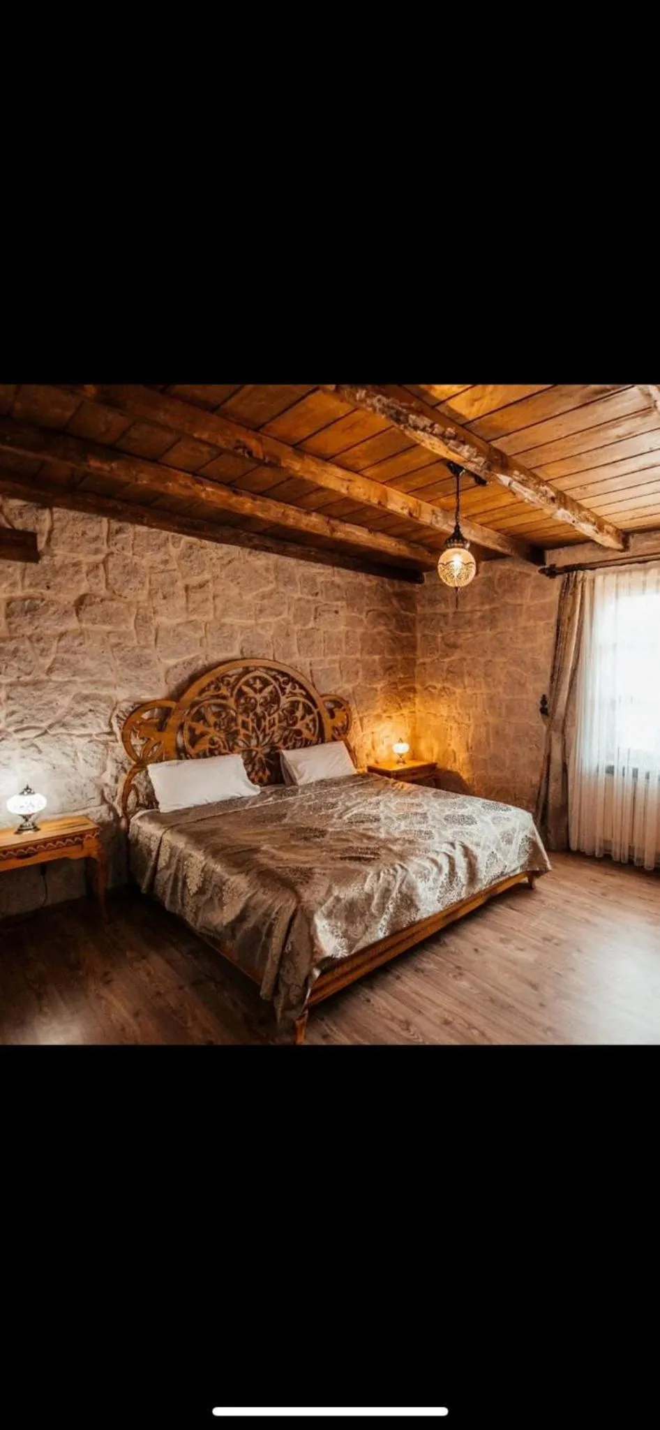 Bed in ELEVRES STONE HOUSE HOTEL