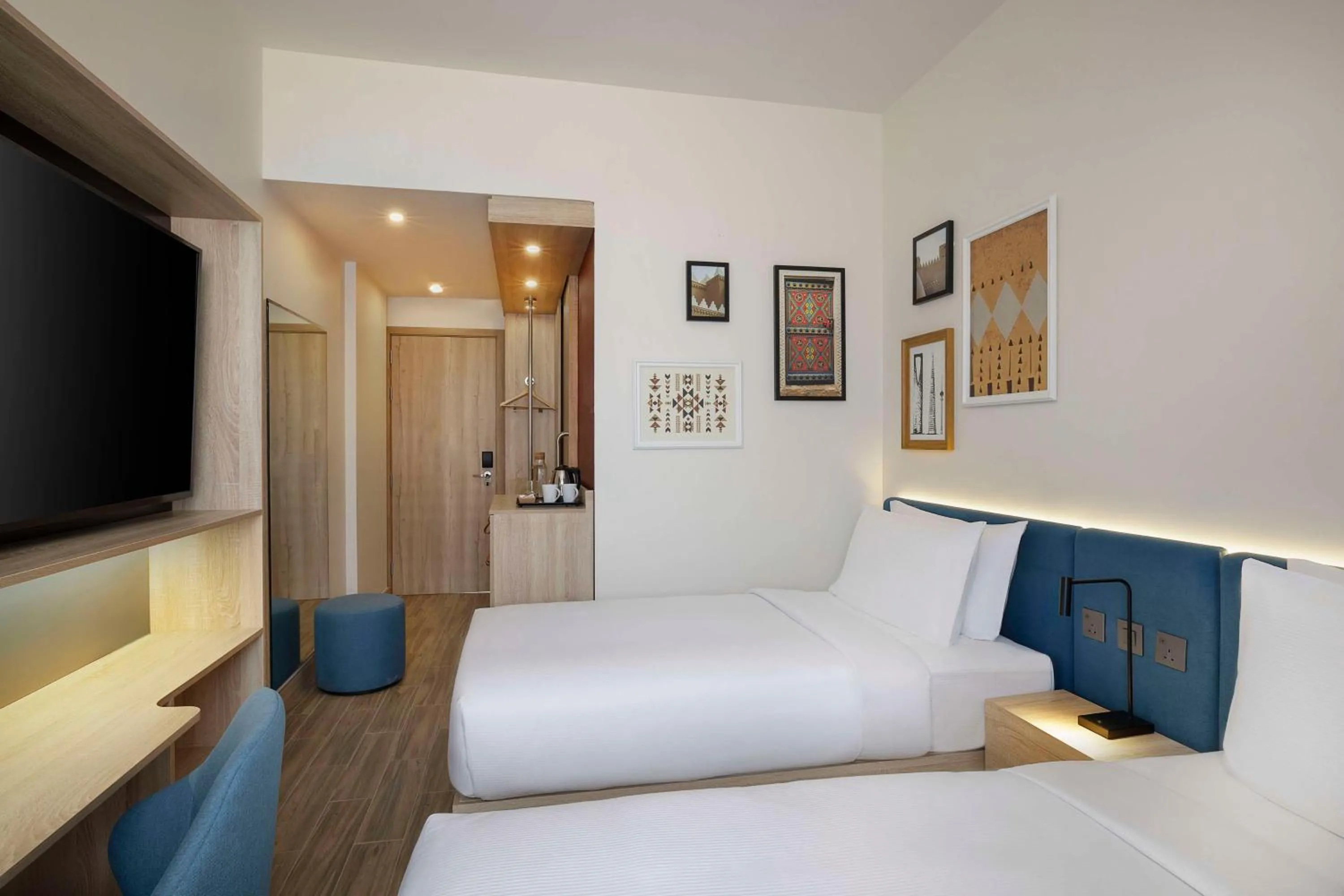 Bed in Hampton by Hilton Sharma NEOM Community 1