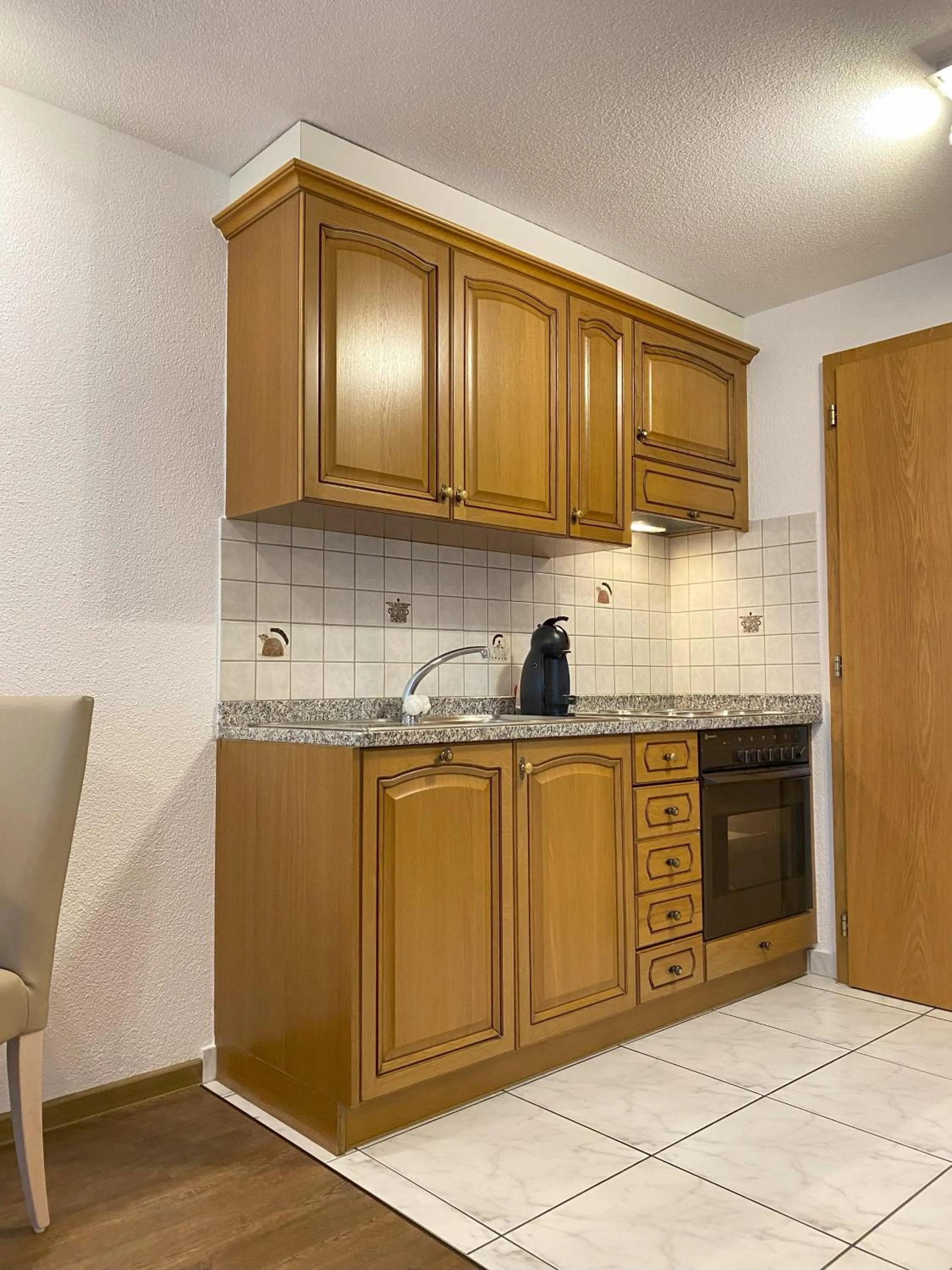 Kitchen or kitchenette in Apartments Arcadia