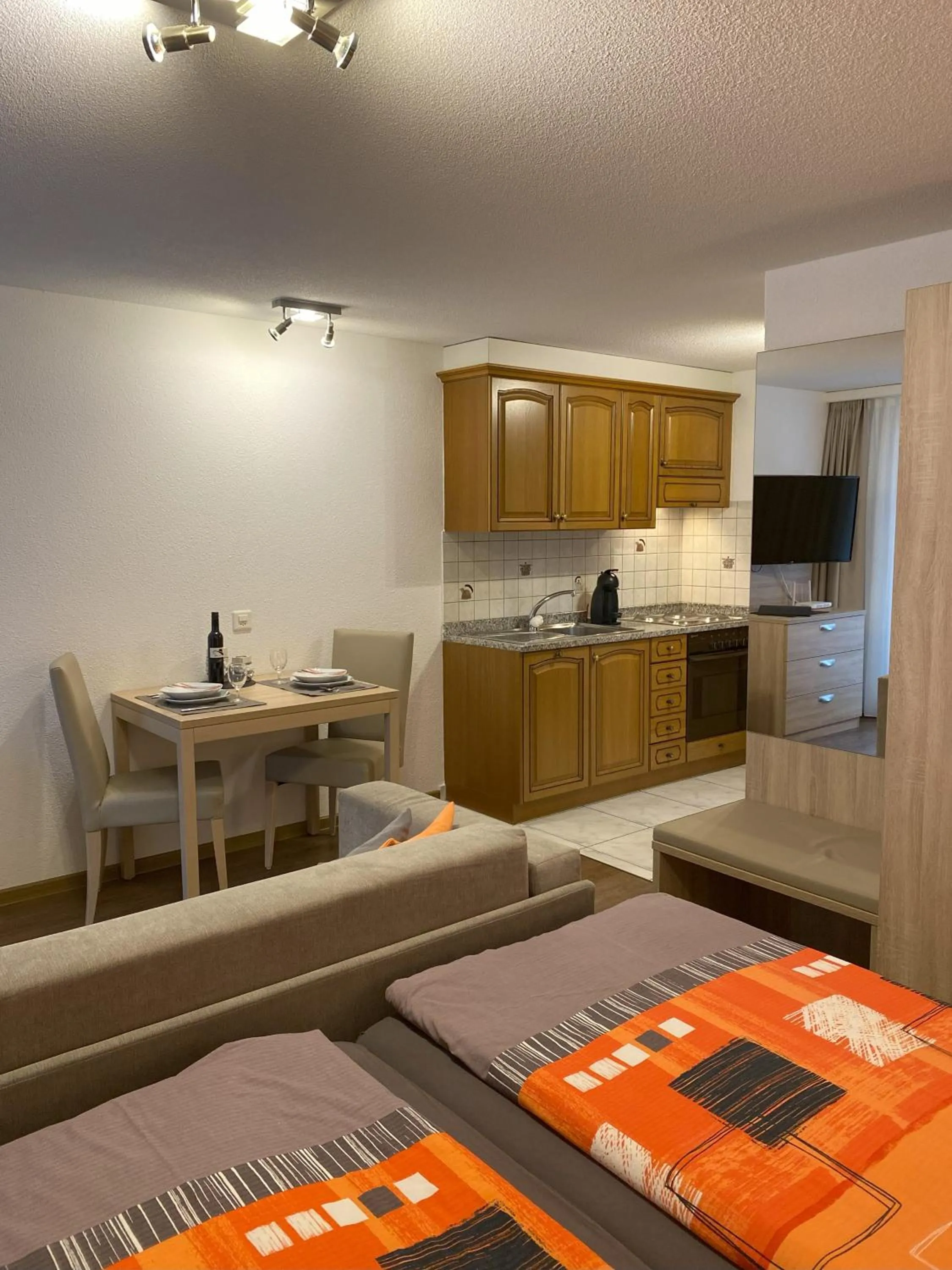 Dining area, Bed in Apartments Arcadia