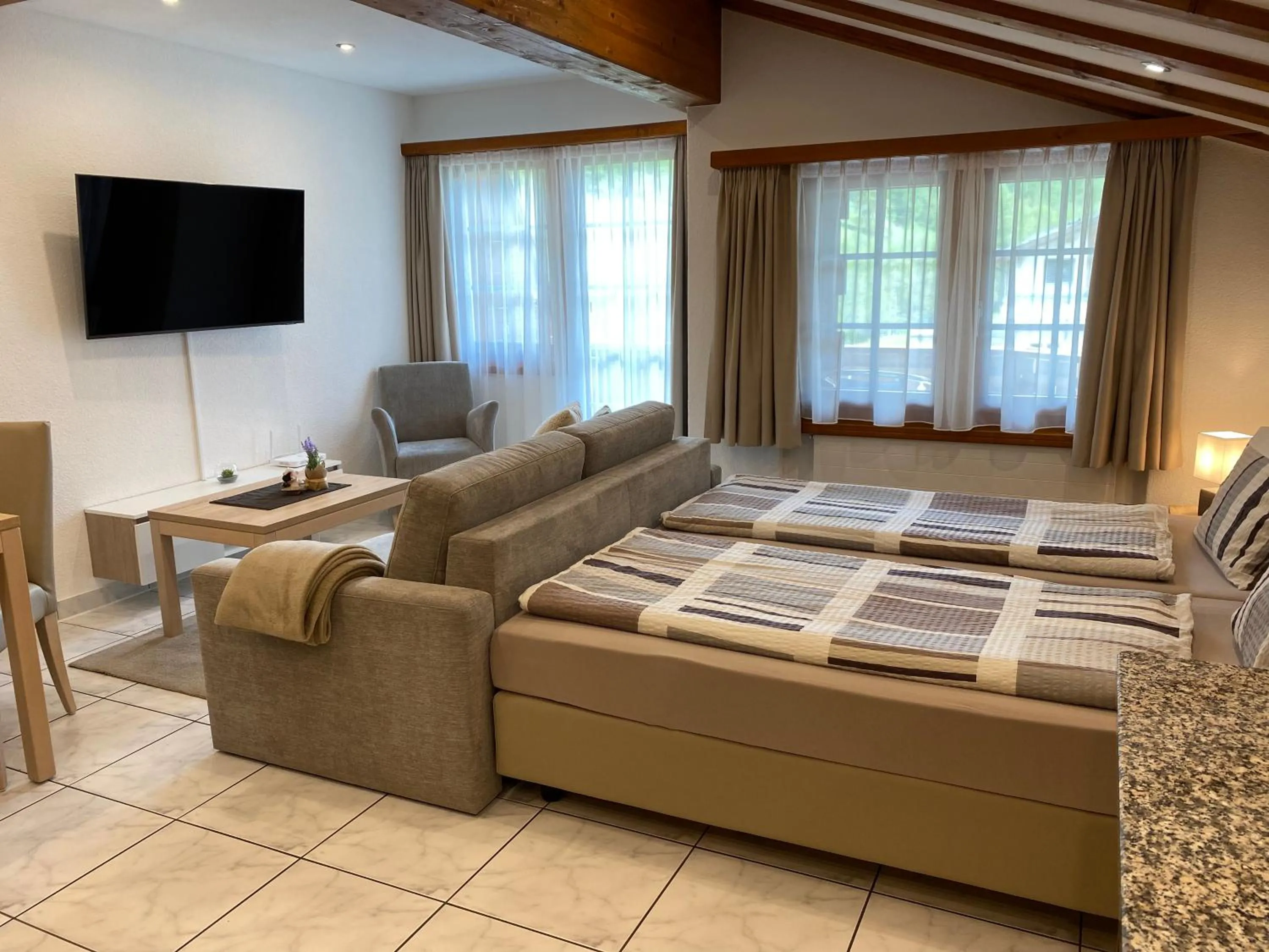 Living room, Bed in Apartments Arcadia