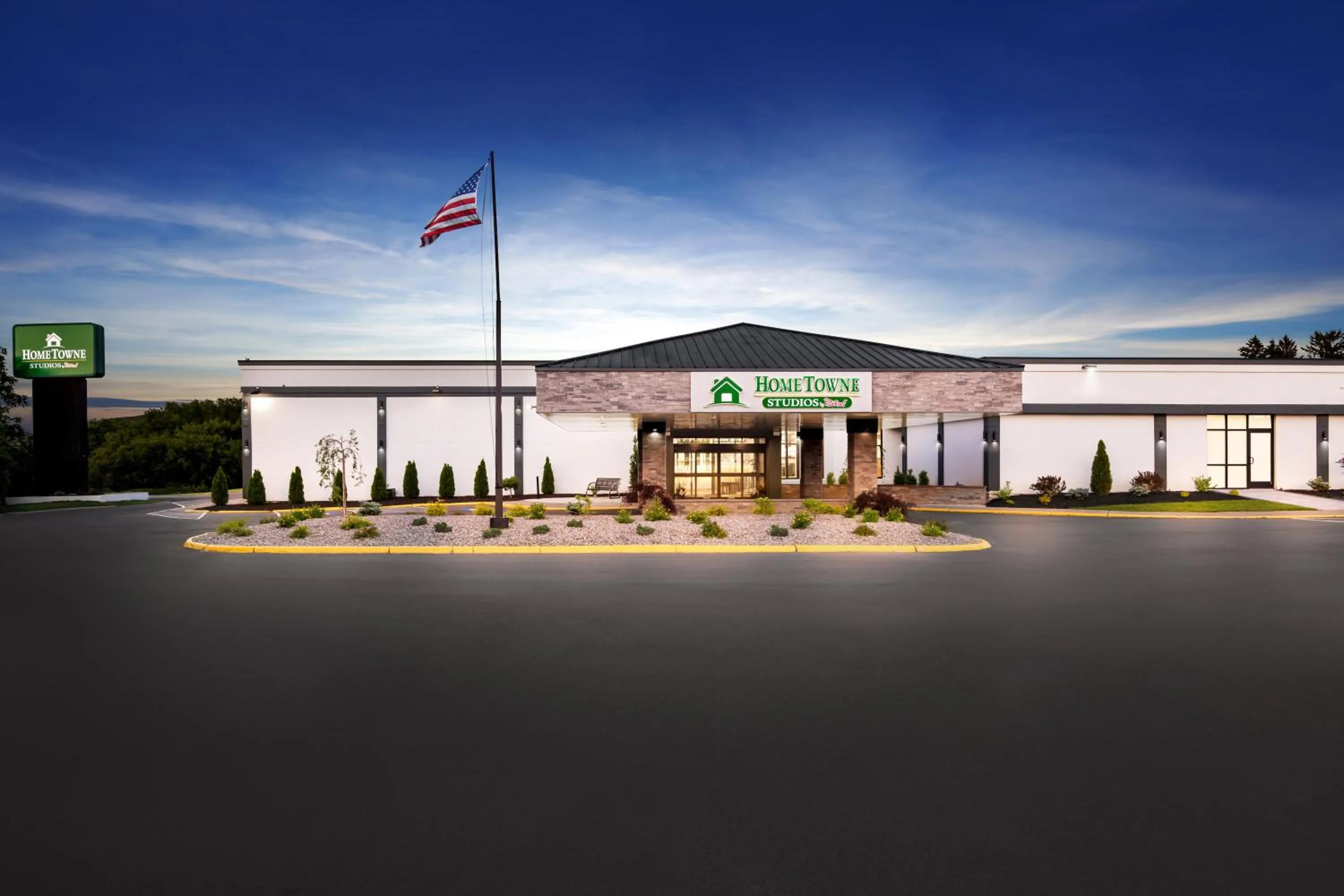 Property building in HomeTowne Studios by Red Roof & Conference Center Cortland