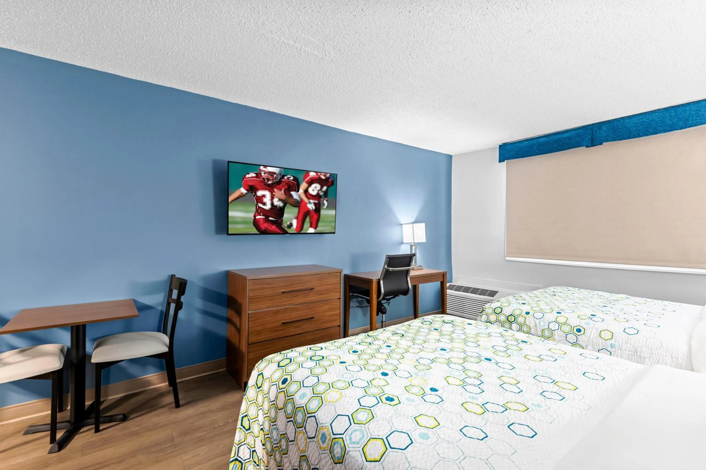 Photo of the whole room, Bed in HomeTowne Studios by Red Roof & Conference Center Cortland