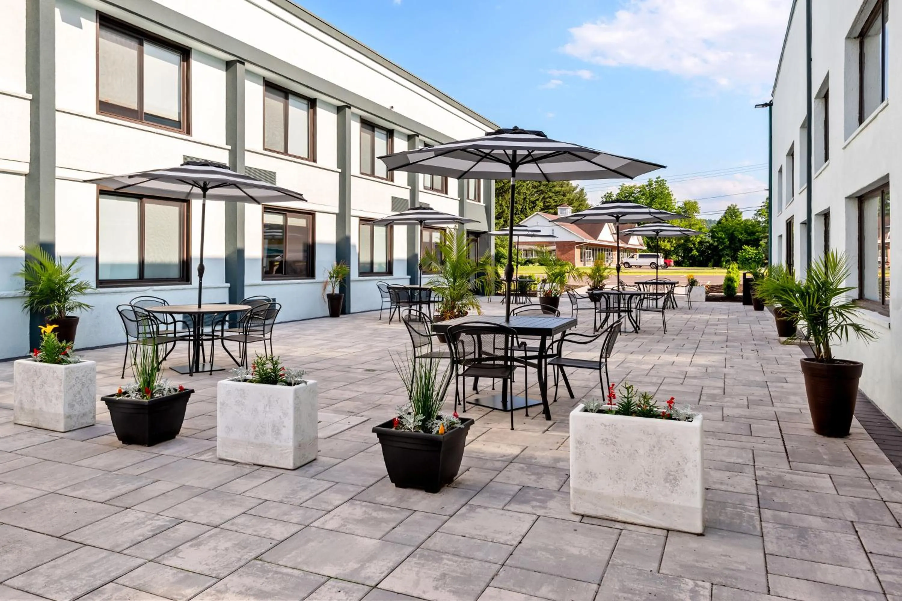 Inner courtyard view in HomeTowne Studios by Red Roof & Conference Center Cortland