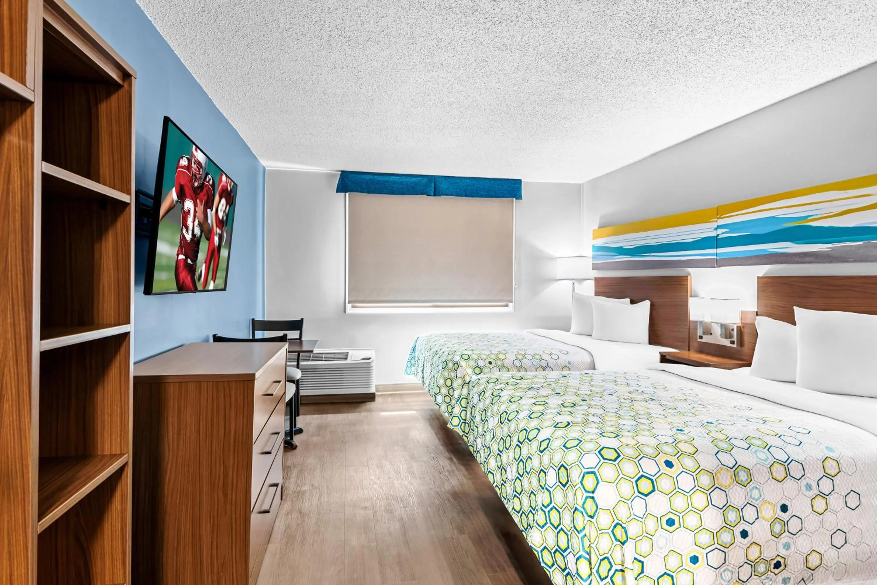 Photo of the whole room, Bed in HomeTowne Studios by Red Roof & Conference Center Cortland