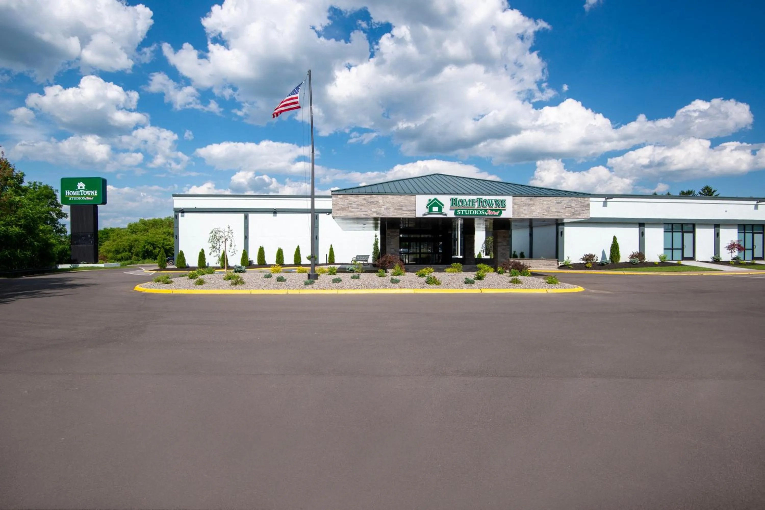 Property building in HomeTowne Studios by Red Roof & Conference Center Cortland