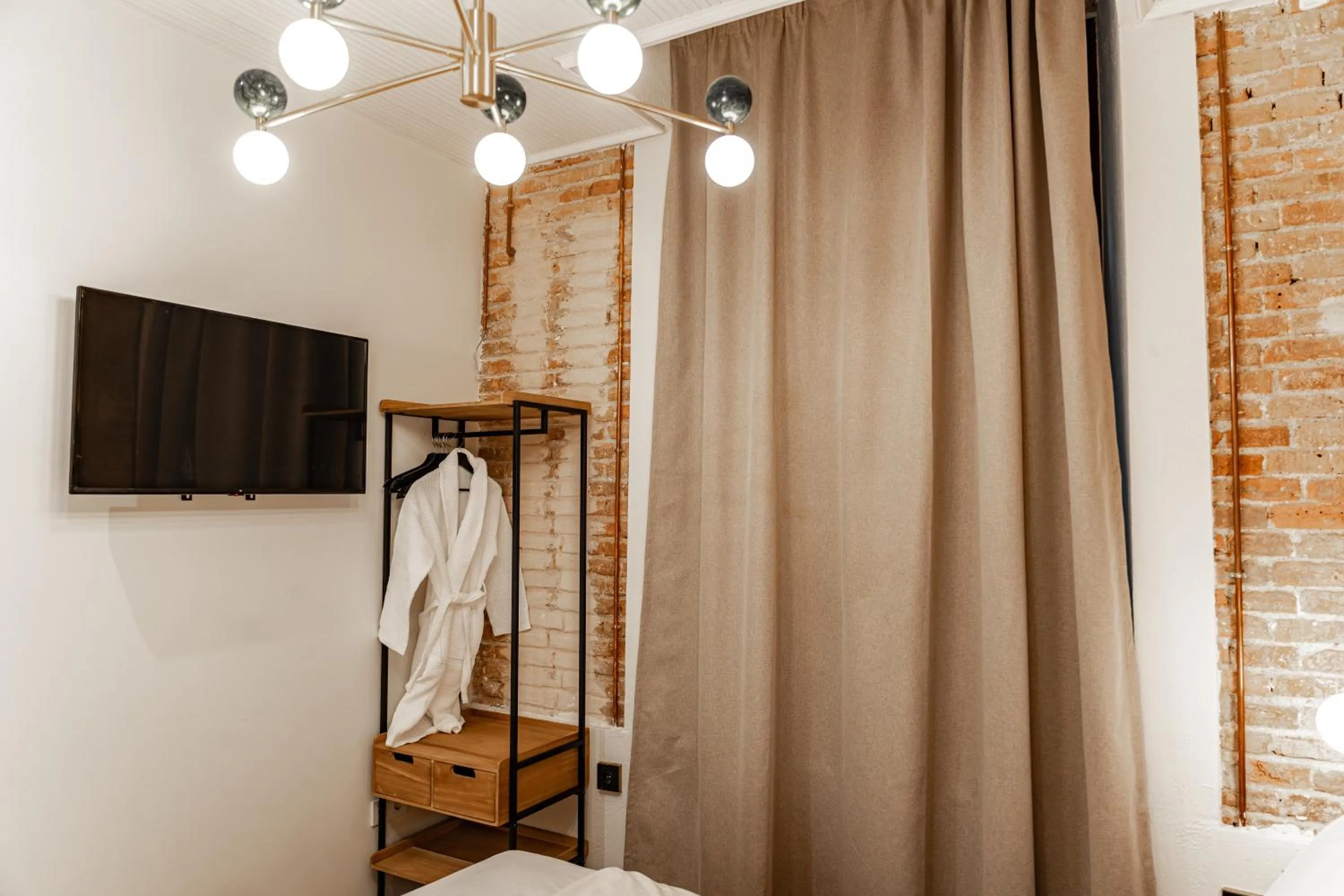 TV and multimedia in Bubaqia House - Suites Boutique