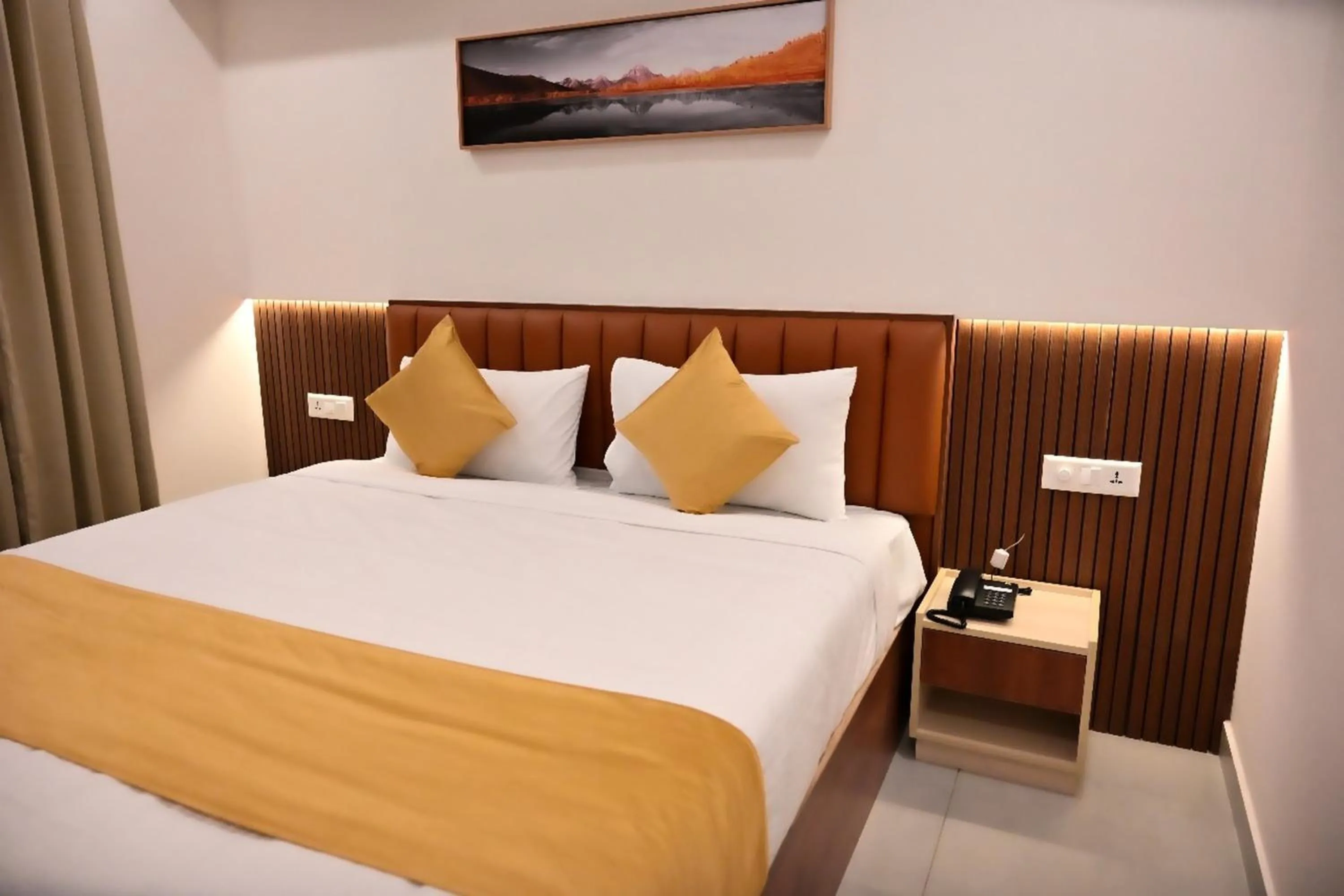 Bed in The Heartland Business Hotel