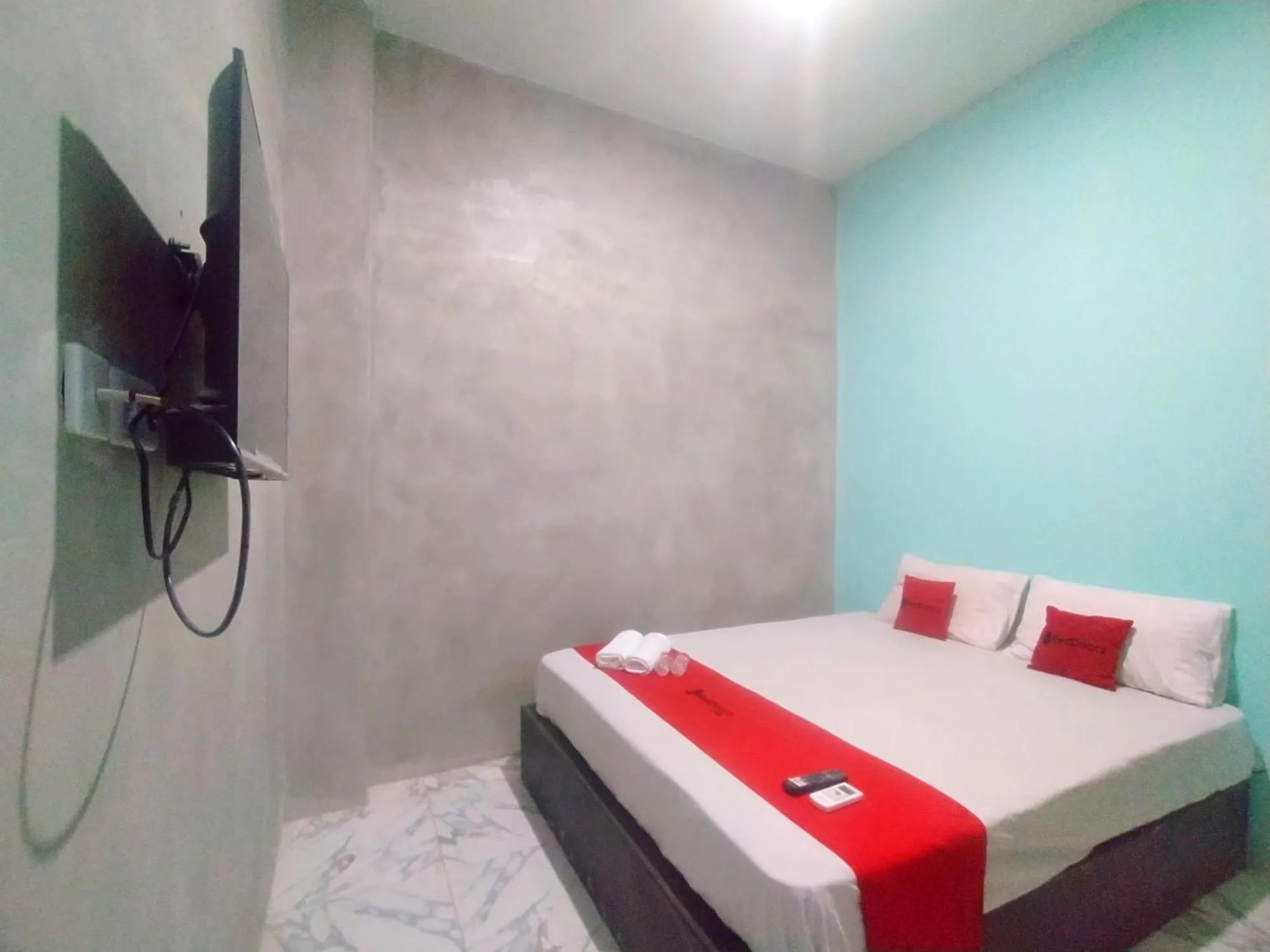 Bed in RedDoorz Syariah near Exit Tol Bojong Pekalongan