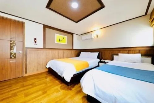 Bed in Jeju B Hotel