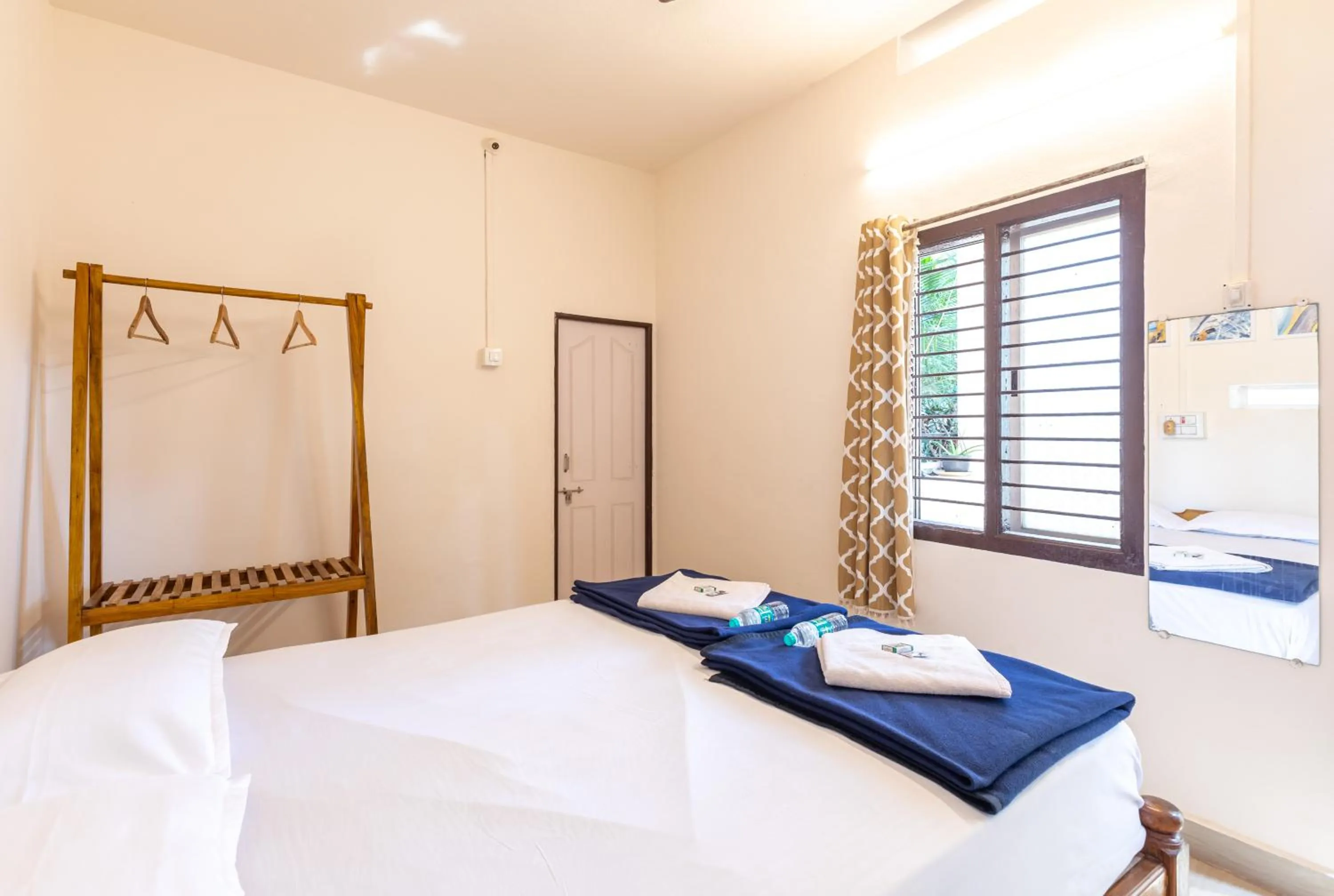 Bed in Sunset Cafe Beach Stay