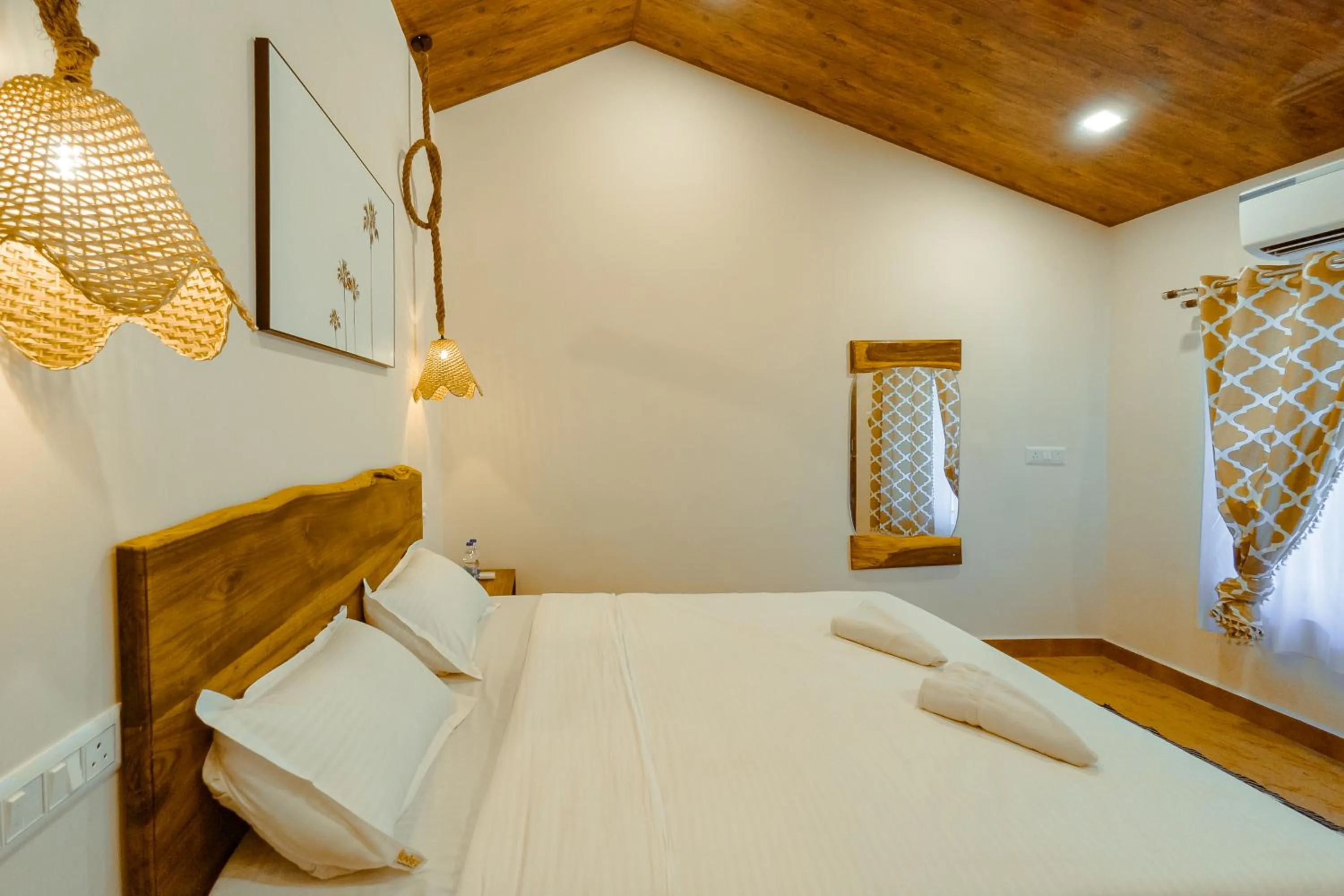 Bed in Sunset Cafe Beach Stay