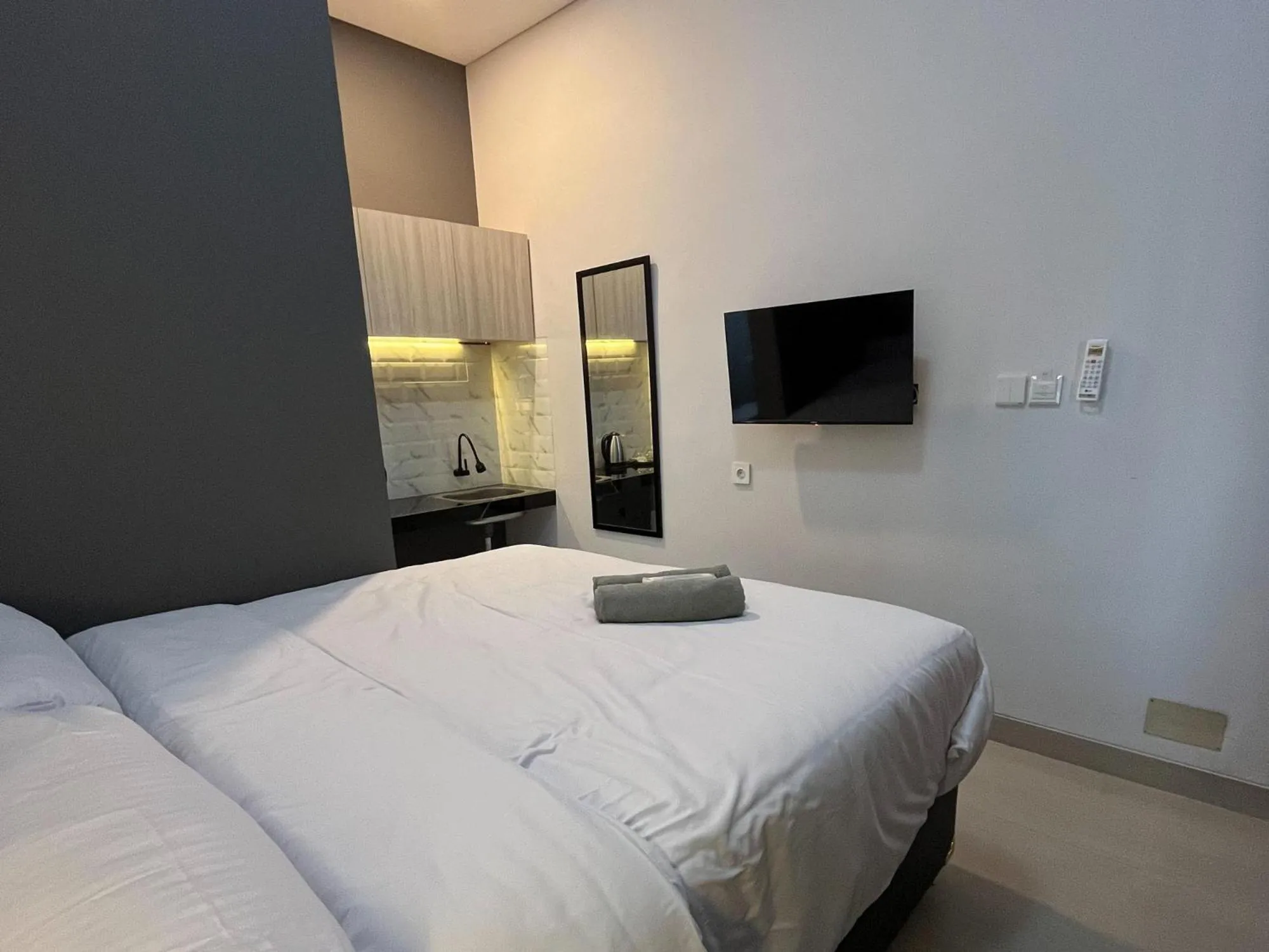 Bed in Kaira Room Guest House Syariah Mitra RedDoorz